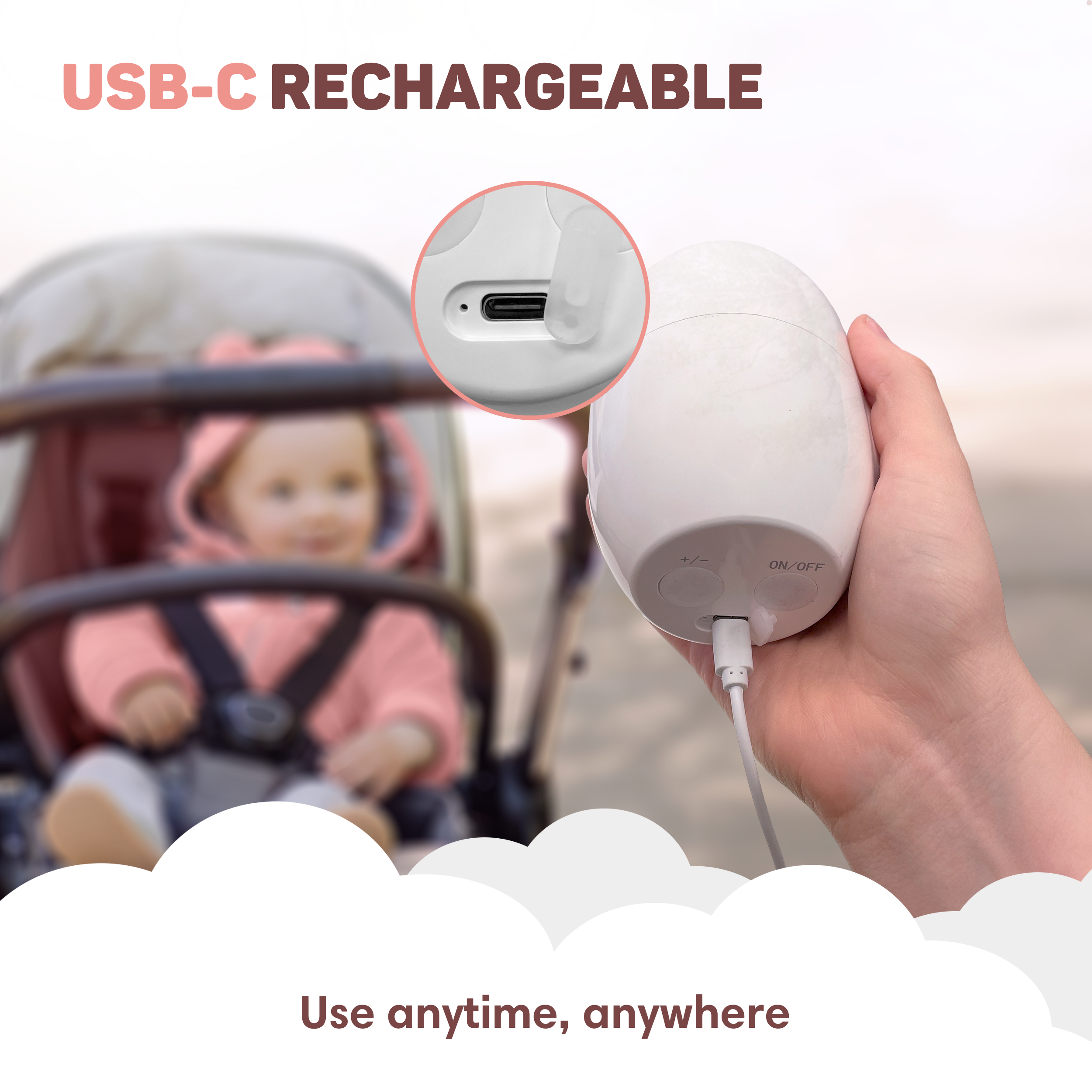 A white device is charging via USB-C cable, with a baby in a stroller in the background.