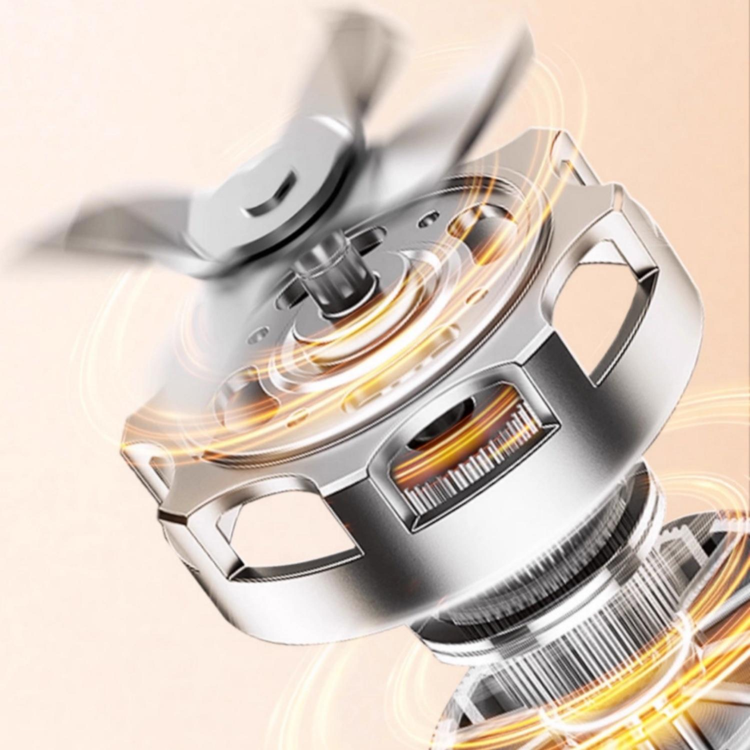 Metallteile eines Mixers mit sich drehenden Klingen und leuchtenden Ringen.