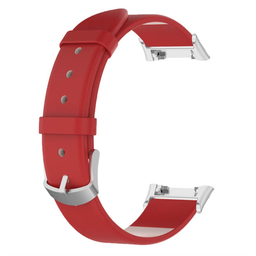 Bracelet de montre rouge avec boucle métallique et goupilles.