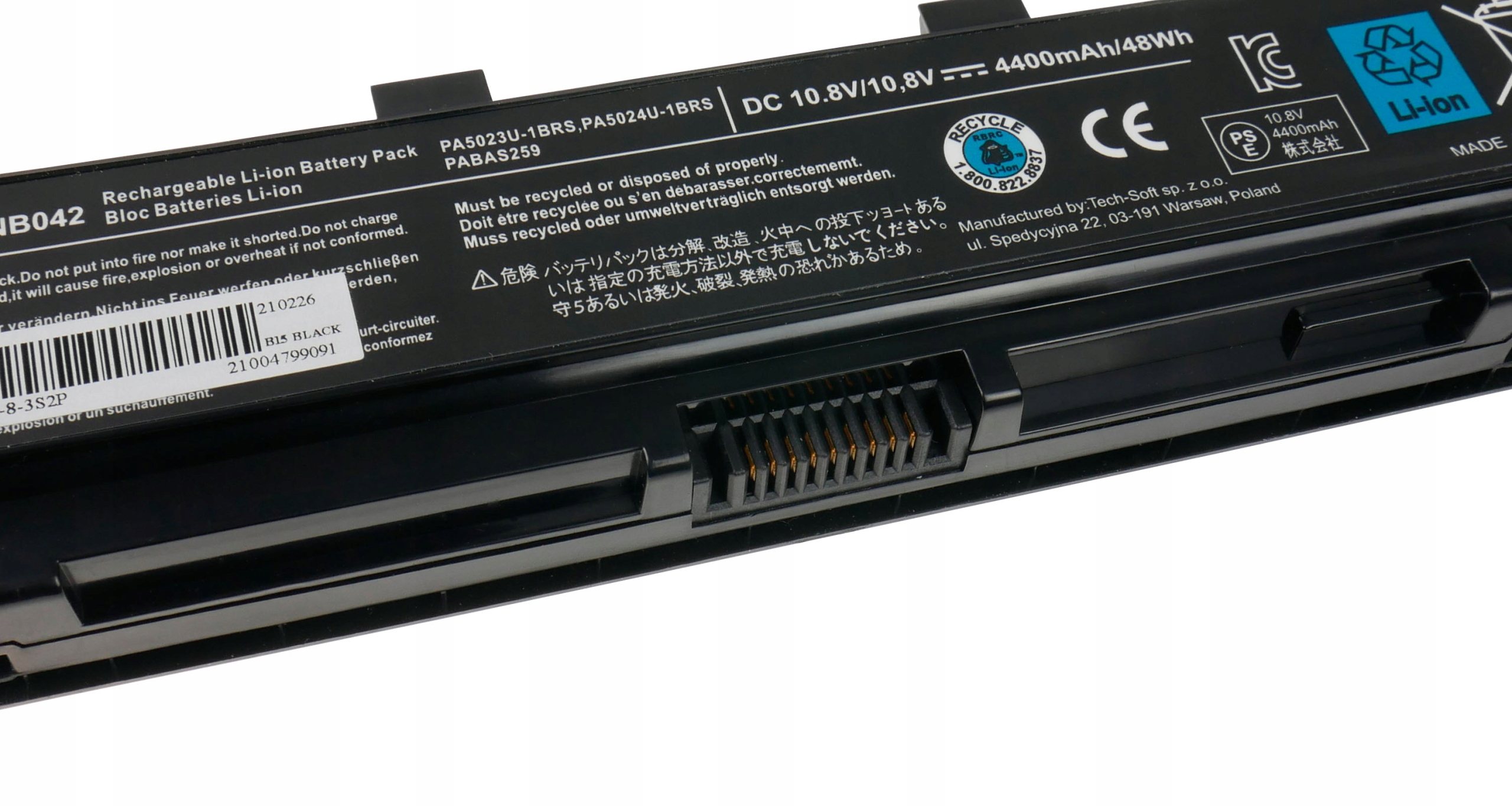 Czarny akumulator Li-ion z numerem modelu i symbolami ostrzegawczymi.