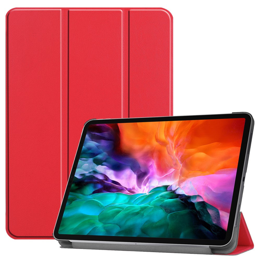 Ein rotes Tablet mit aufgestellter Hülle und farbenfrohem Hintergrundbild.