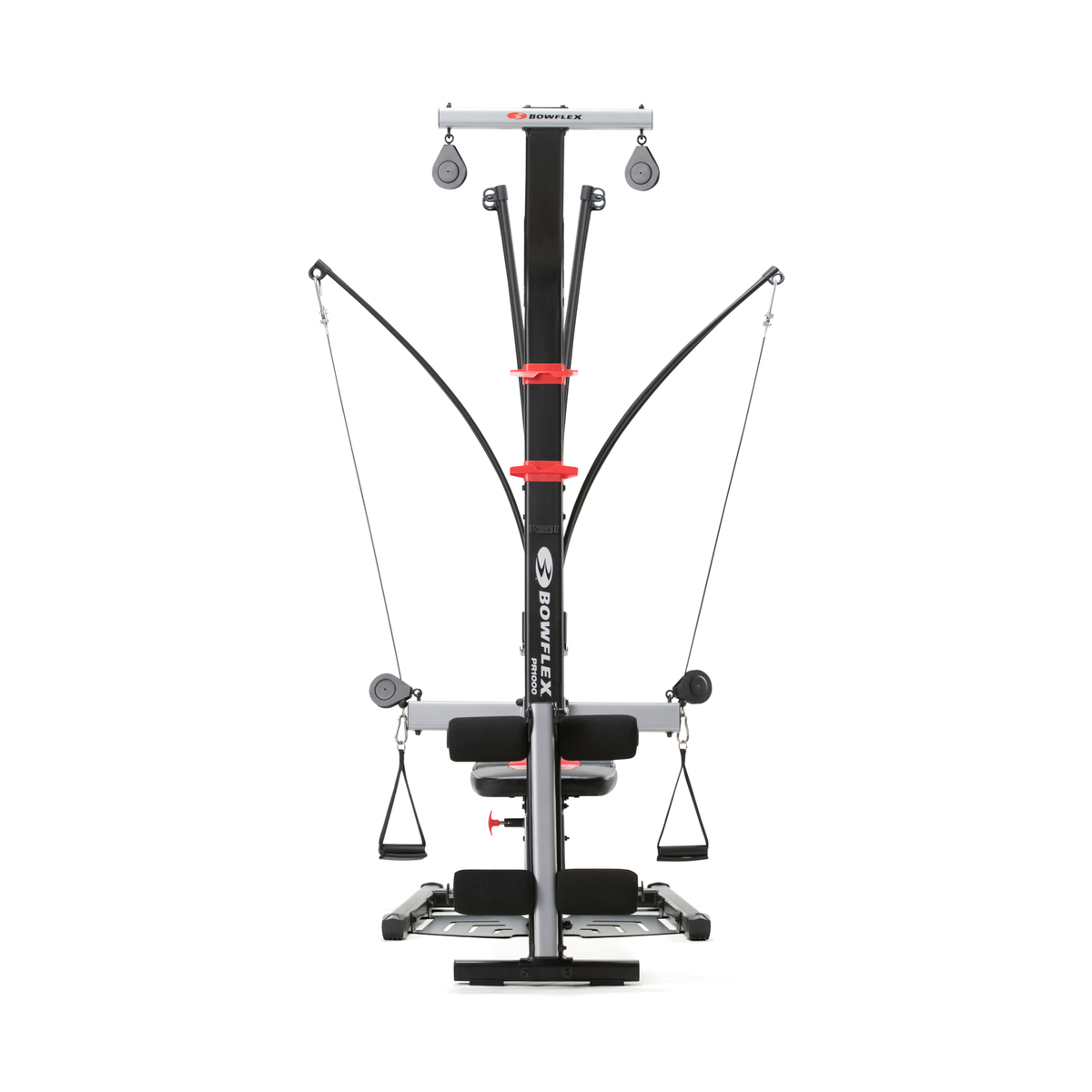 Una máquina de gimnasio en casa Bowflex con marco negro, acentos rojos y sistema de poleas.