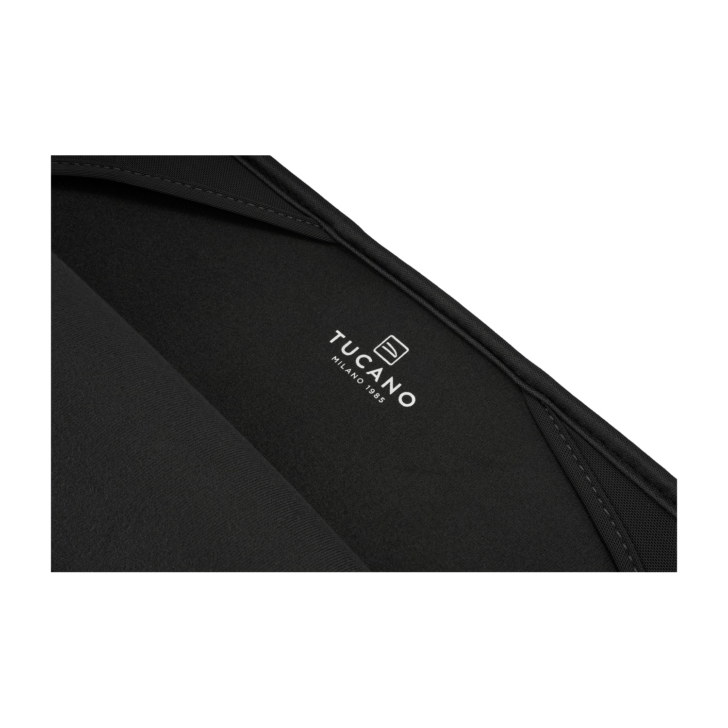 Black Tucano bag with white logo and text.