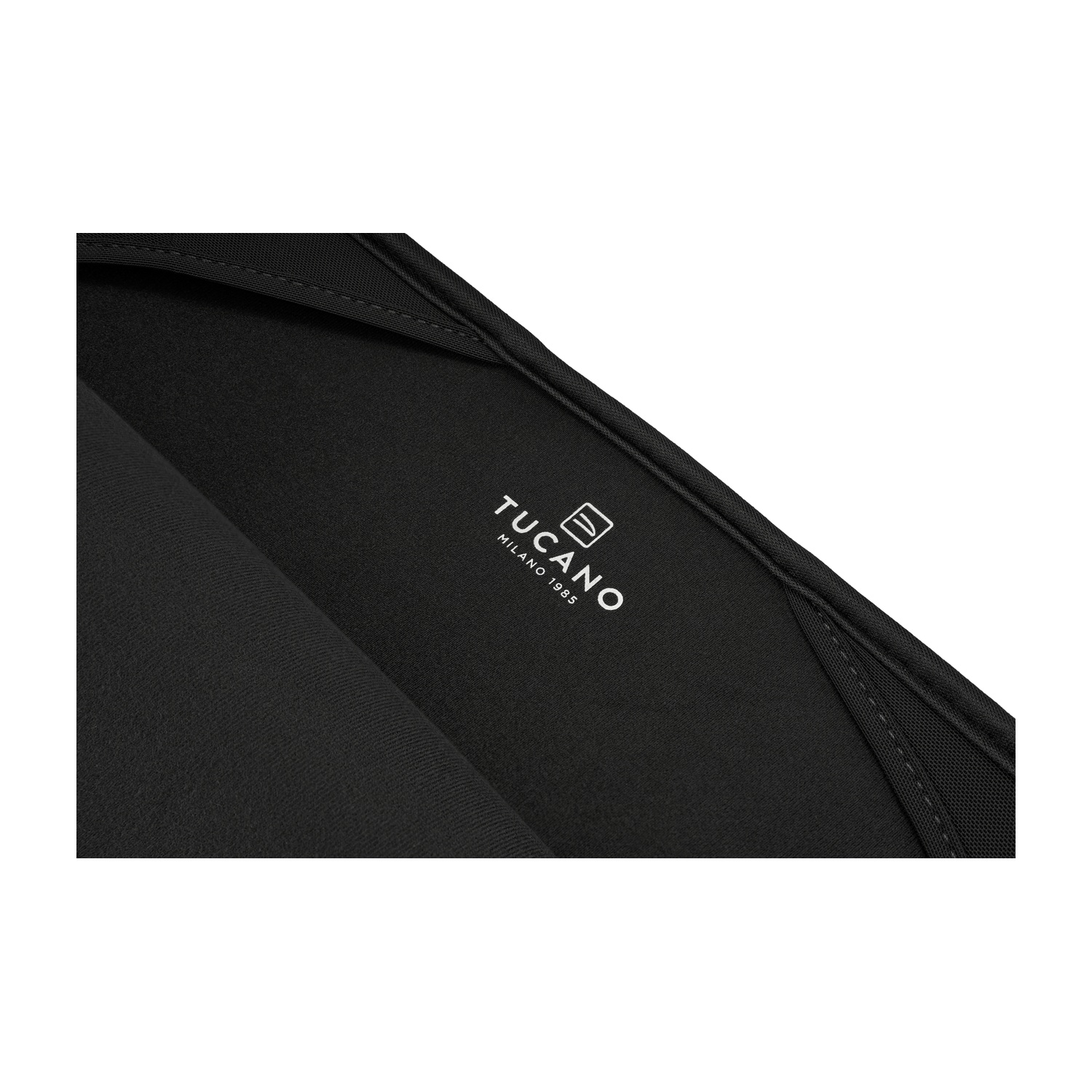 Black bag with white Tucano logo and "Milano 1985" text.