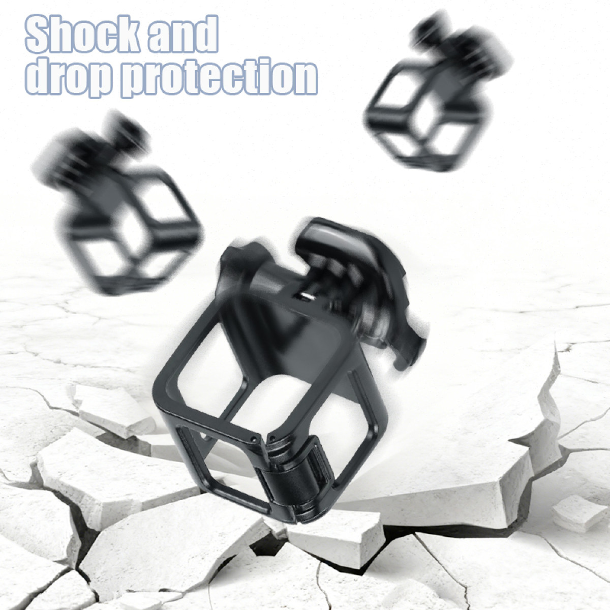 Trzy czarne obudowy ochronne spadające na popękany beton.