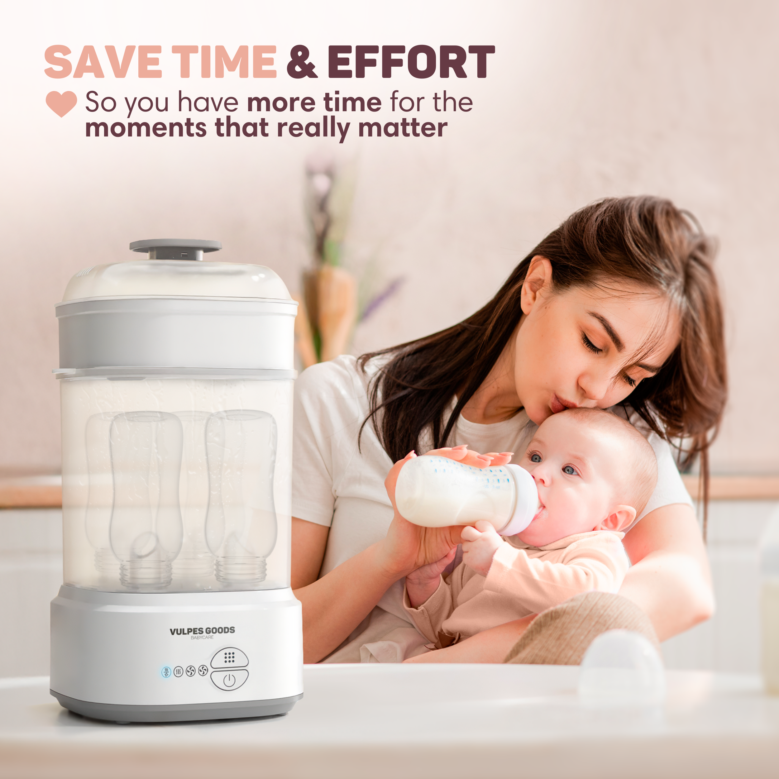 Eine Mutter füttert ihr Baby mit einer Flasche neben einem Sterilisator.
