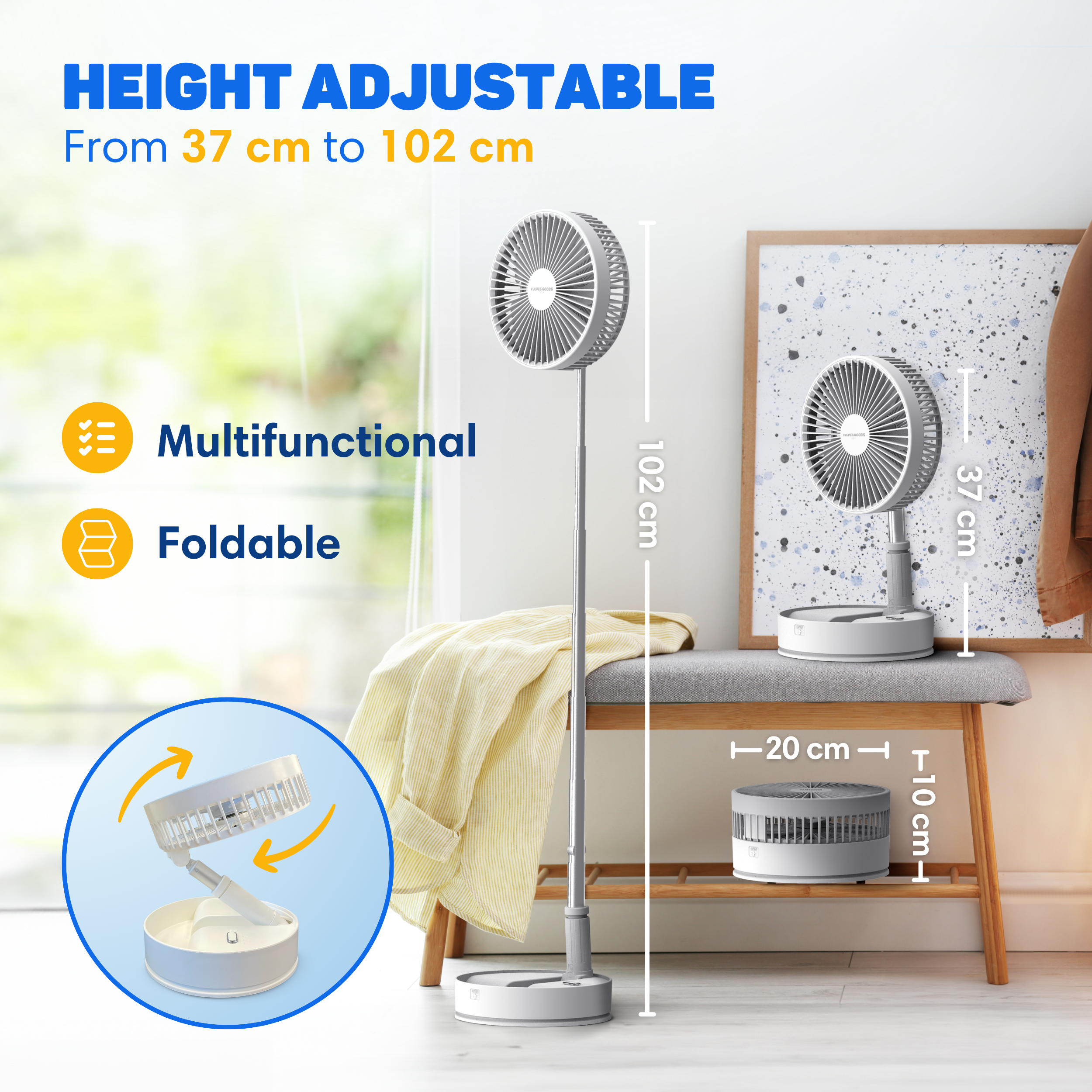 An adjustable fan stands next to a bench with a yellow blanket draped over it.