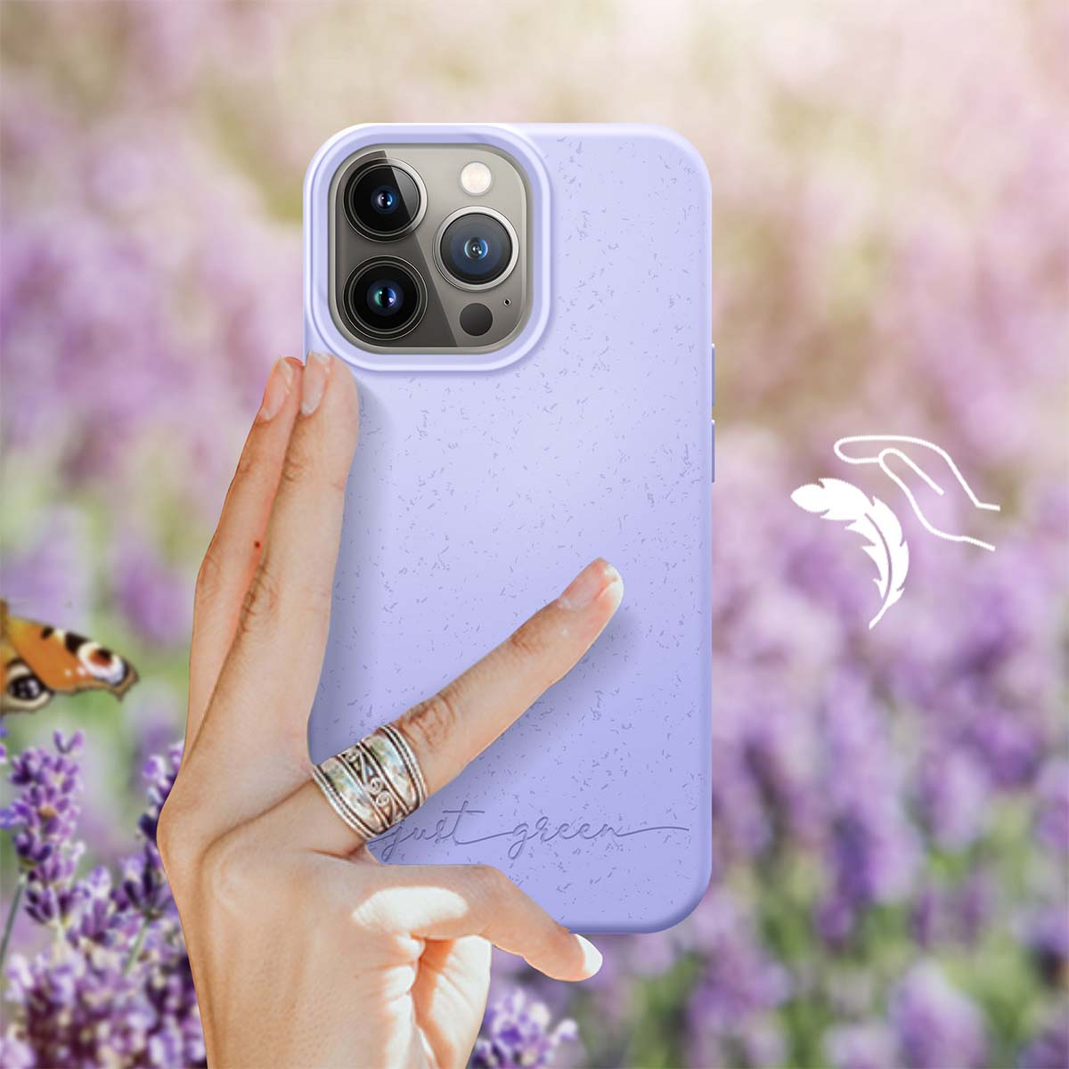 Lavendel-Hintergrund mit einem lila Handy und einer Hand, die es hält.