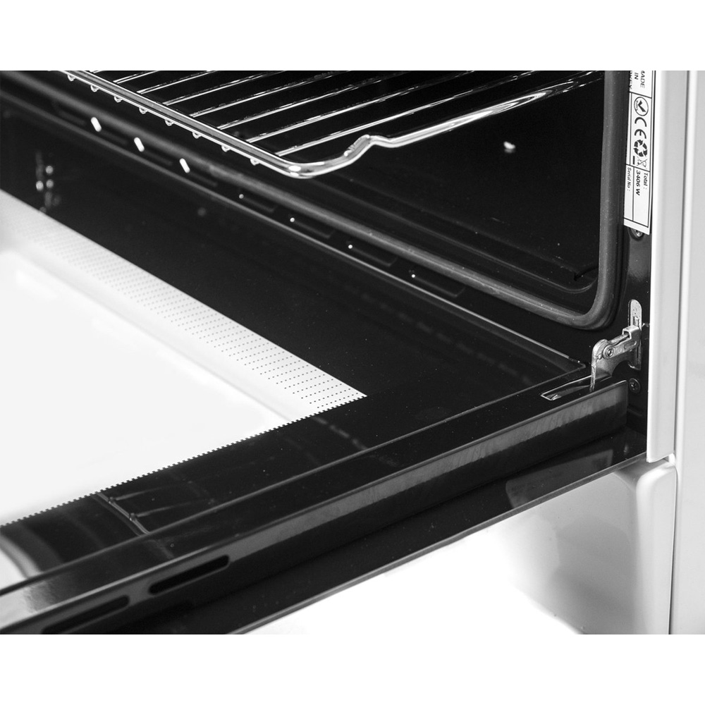 Close-up of an open oven, showing the grill rack and black interior.
