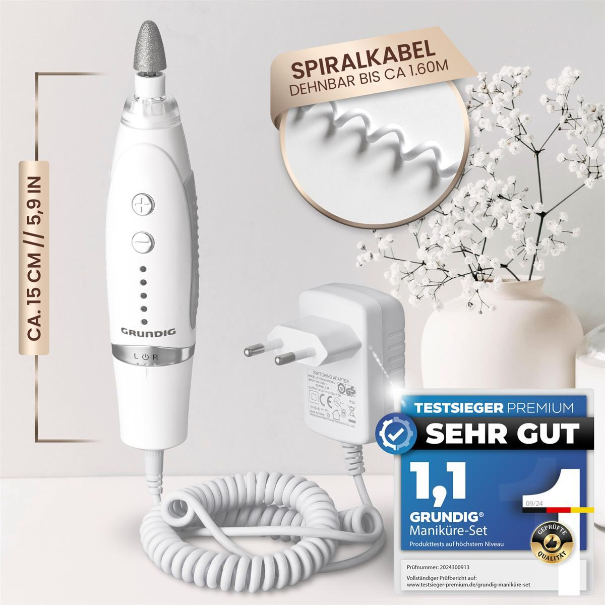 Ein weißes Grundig Maniküre-Set mit Spiralkabel und Netzteil.
