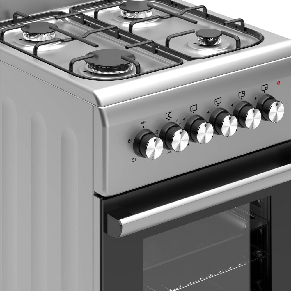 Close-up of a silver gas stove with four burners and control knobs.