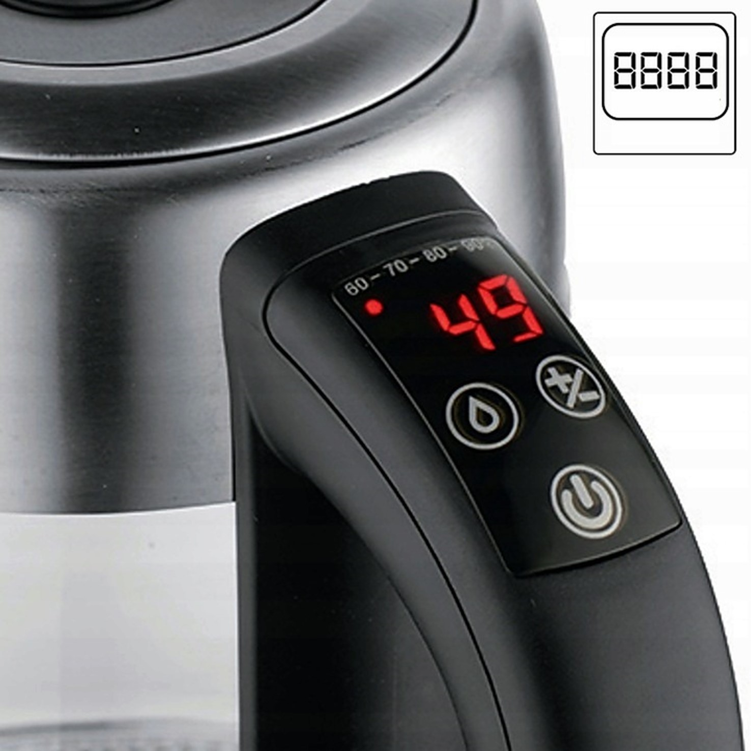 Czajnik z cyfrowym wyświetlaczem pokazującym 49 stopni Celsjusza.