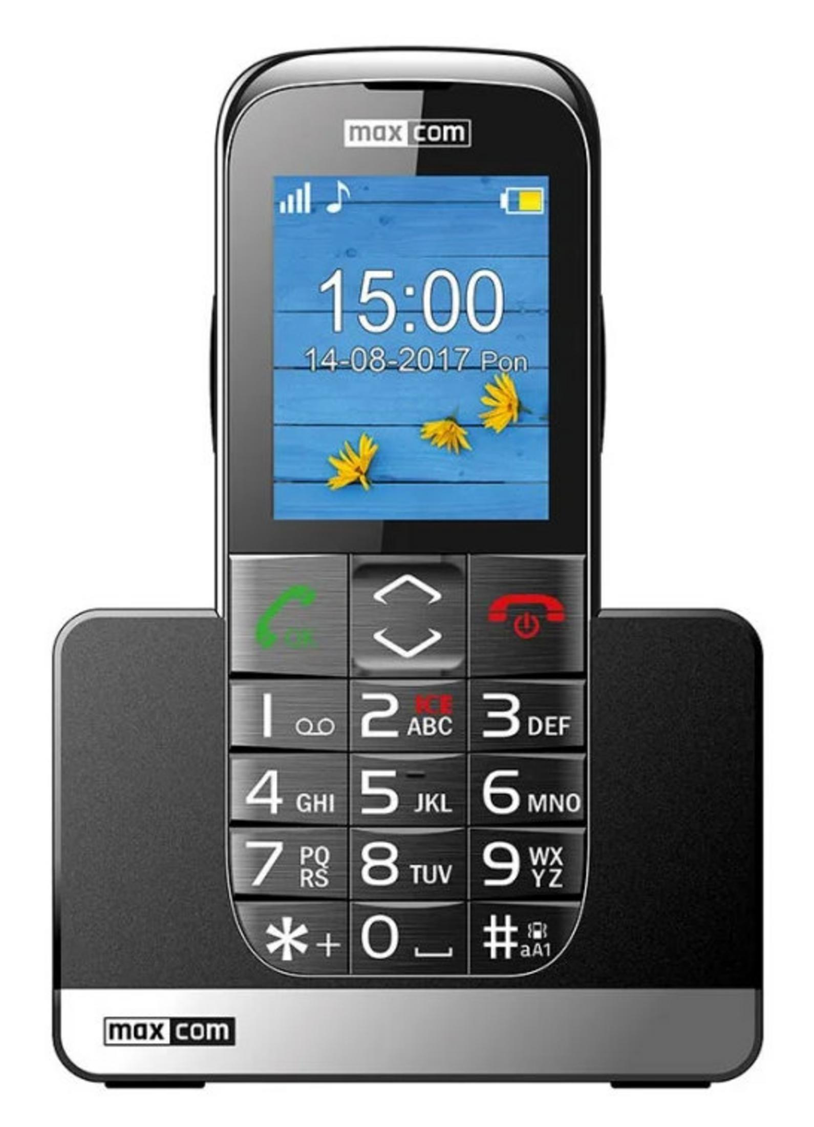 Un telefono cellulare nero Maxcom con tastiera grande e schermo che mostra le 15:00.