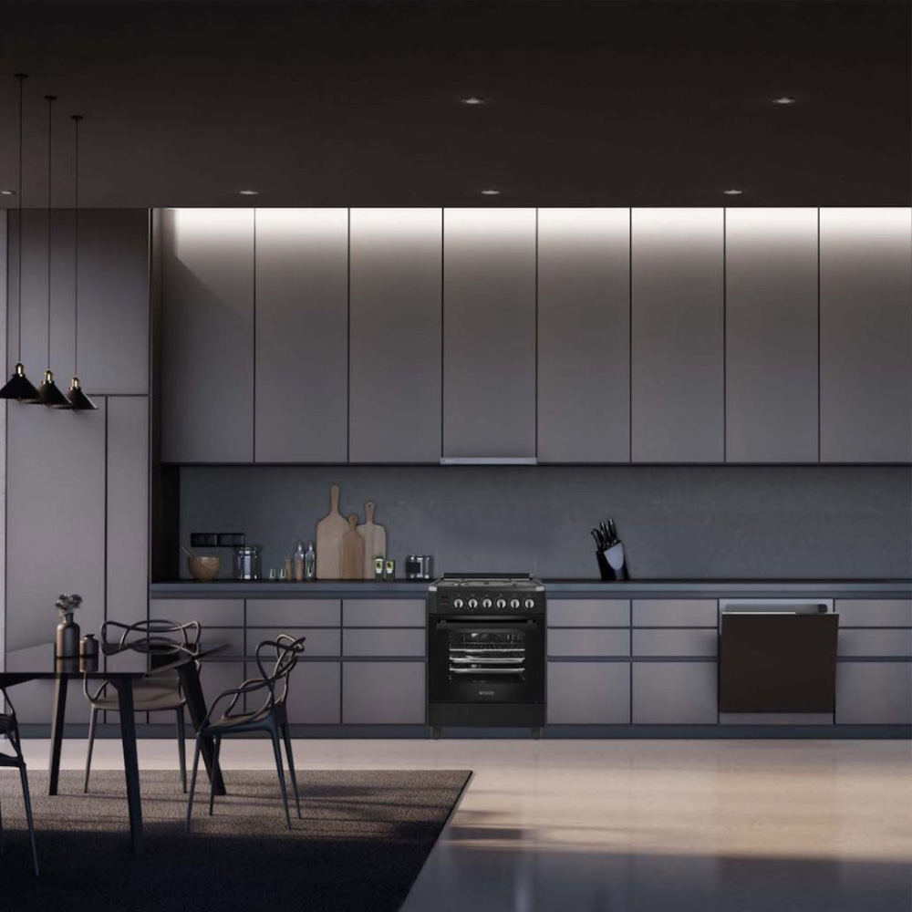 Modern kitchen with black appliances, dining area, and grey cabinets.