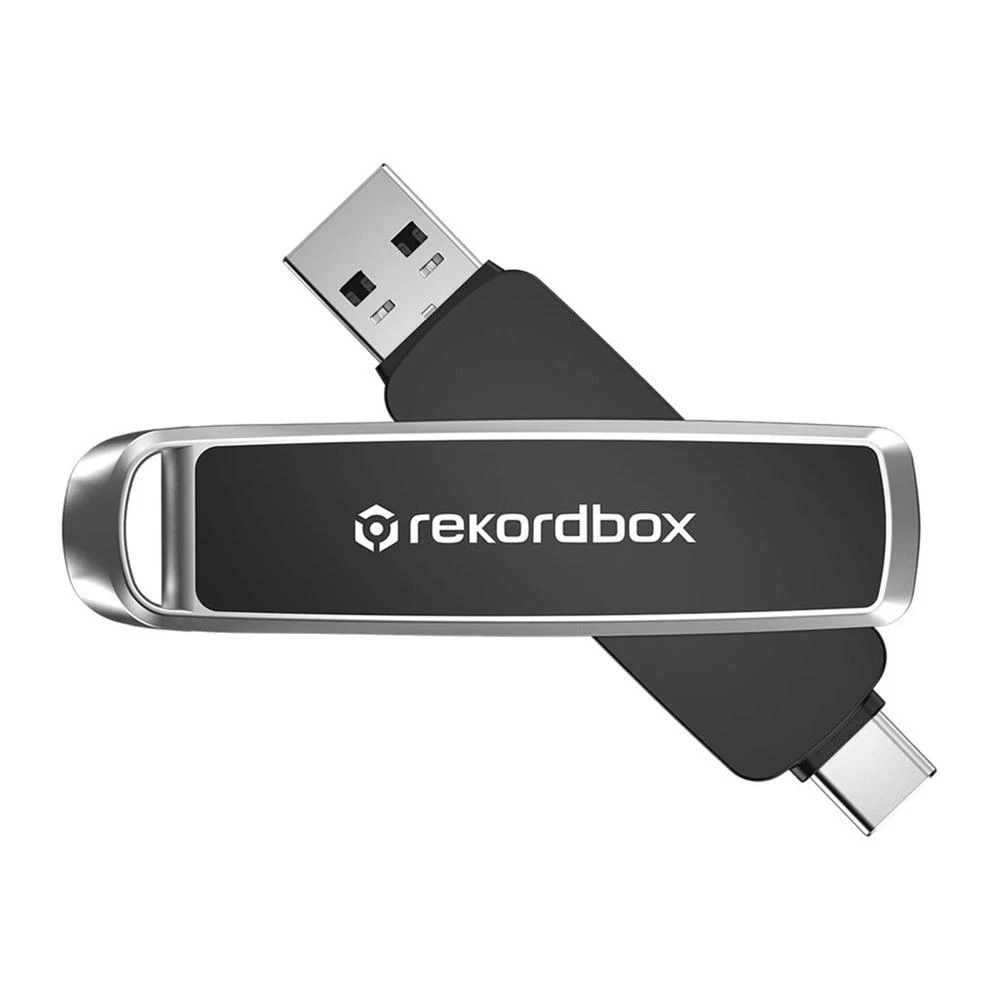 Chiavetta USB nera con finiture argentate e logo 'rekordbox'. Connettori USB-A e USB-C.