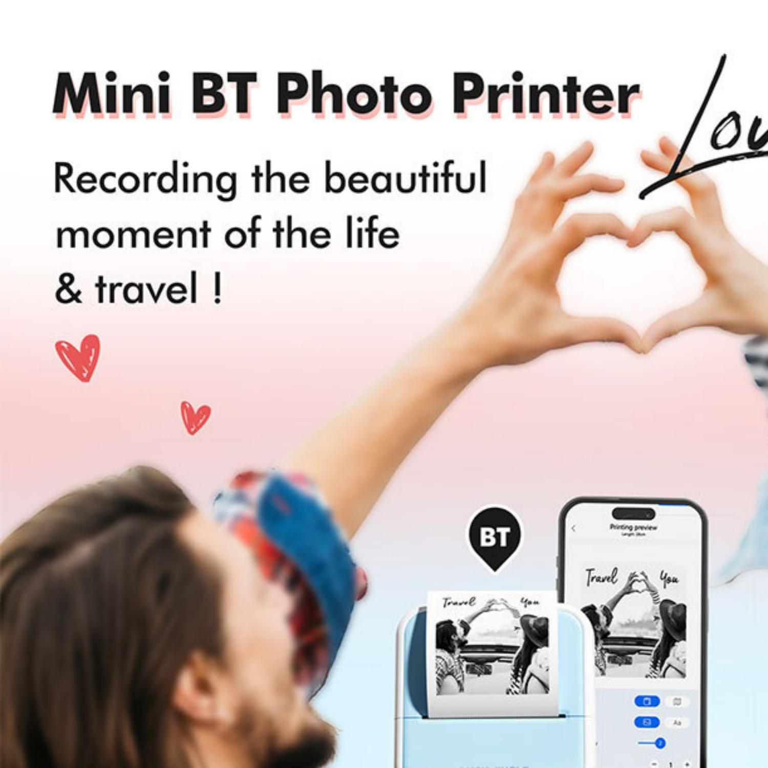 Mini BT Fotodrucker mit Handy und Foto. Hände formen ein Herz.