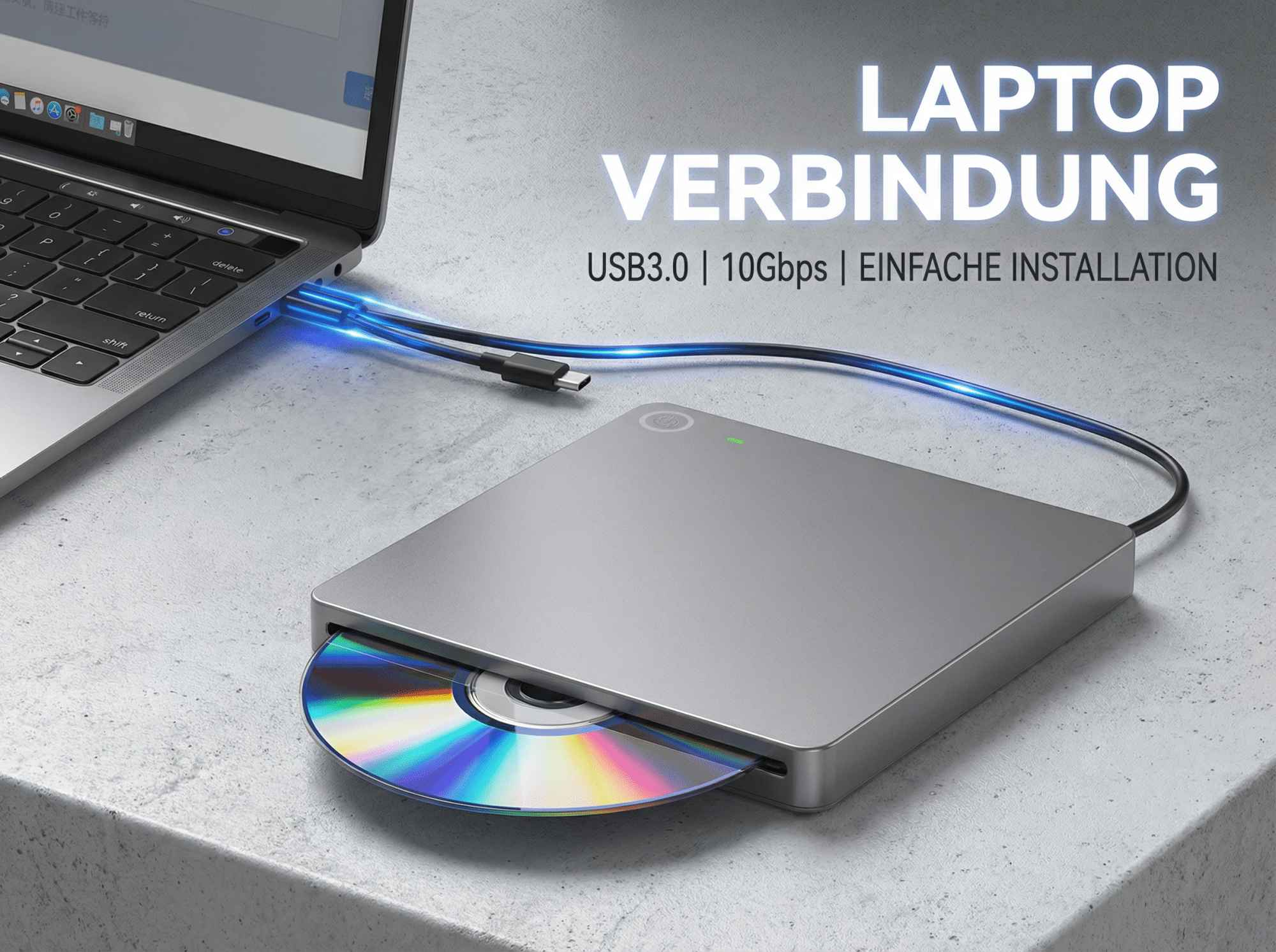 Ein silbernes externes CD-Laufwerk wird an einen Laptop angeschlossen.