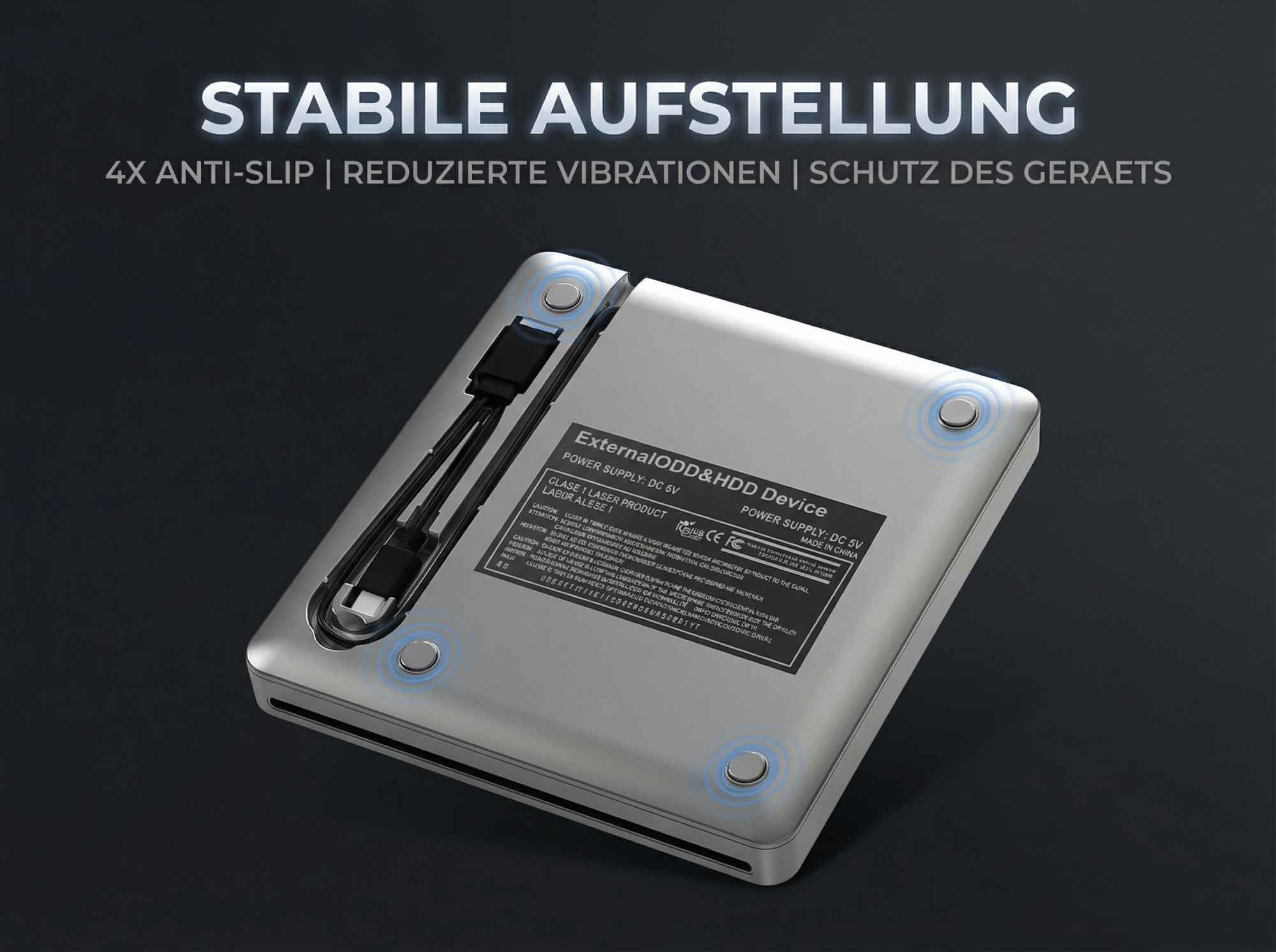 Externes Laufwerk mit vier rutschfesten Füßen und Kabeln, stabil und vibrationsarm.