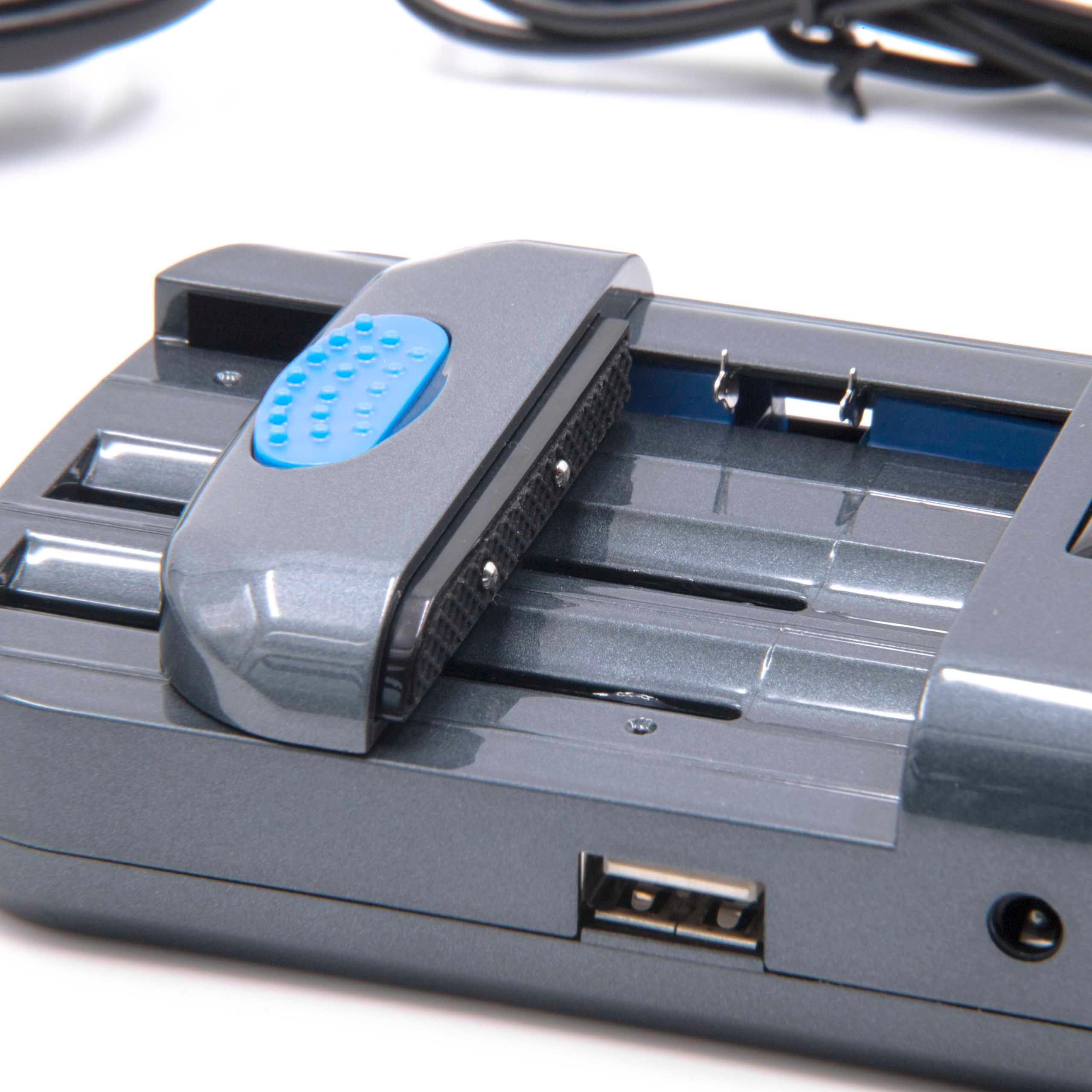 Graues Ladegehäuse mit blauer Taste und USB-Anschluss.