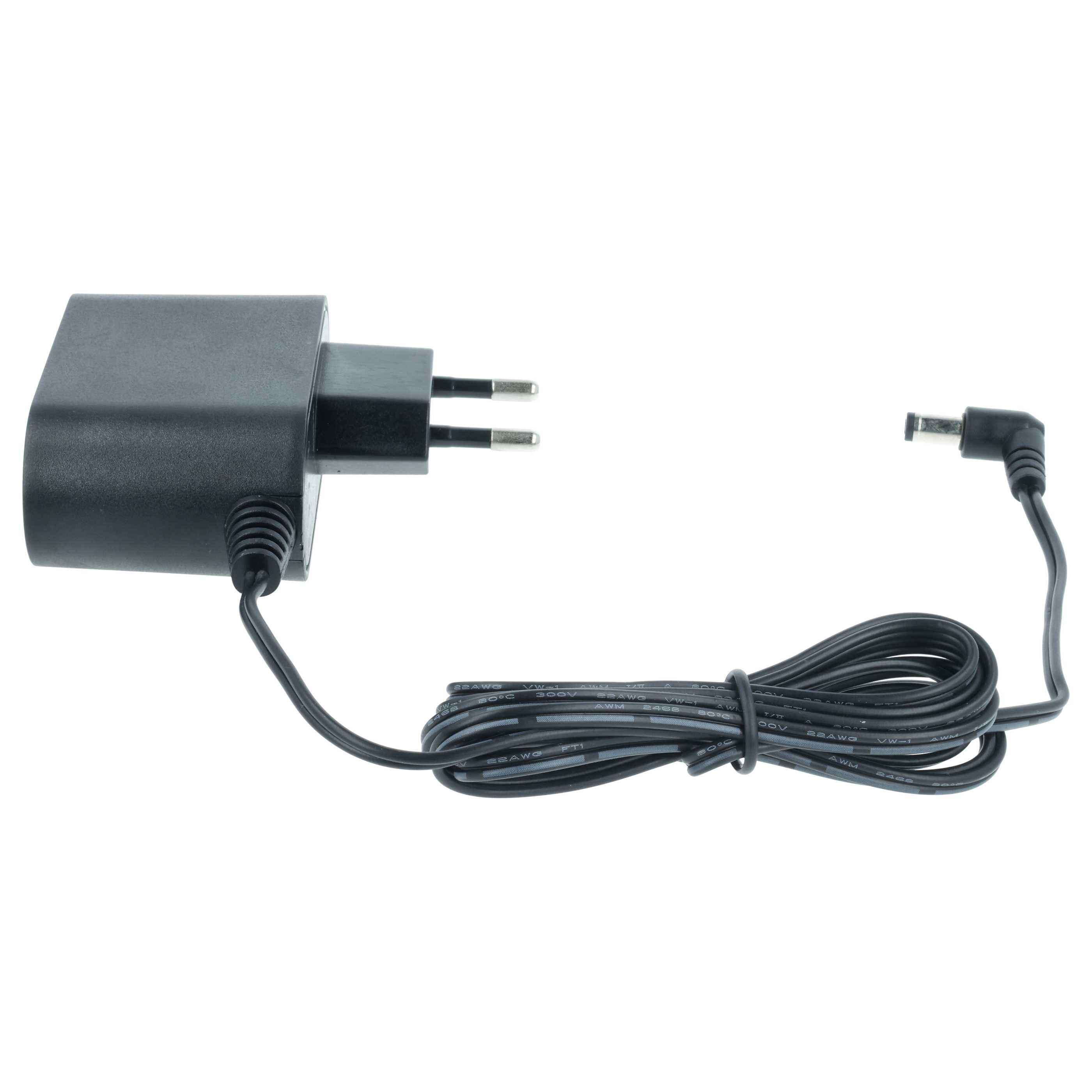 Schwarzes Netzteil mit zwei Metallstiften und einem Kabel mit abgewinkeltem Stecker.