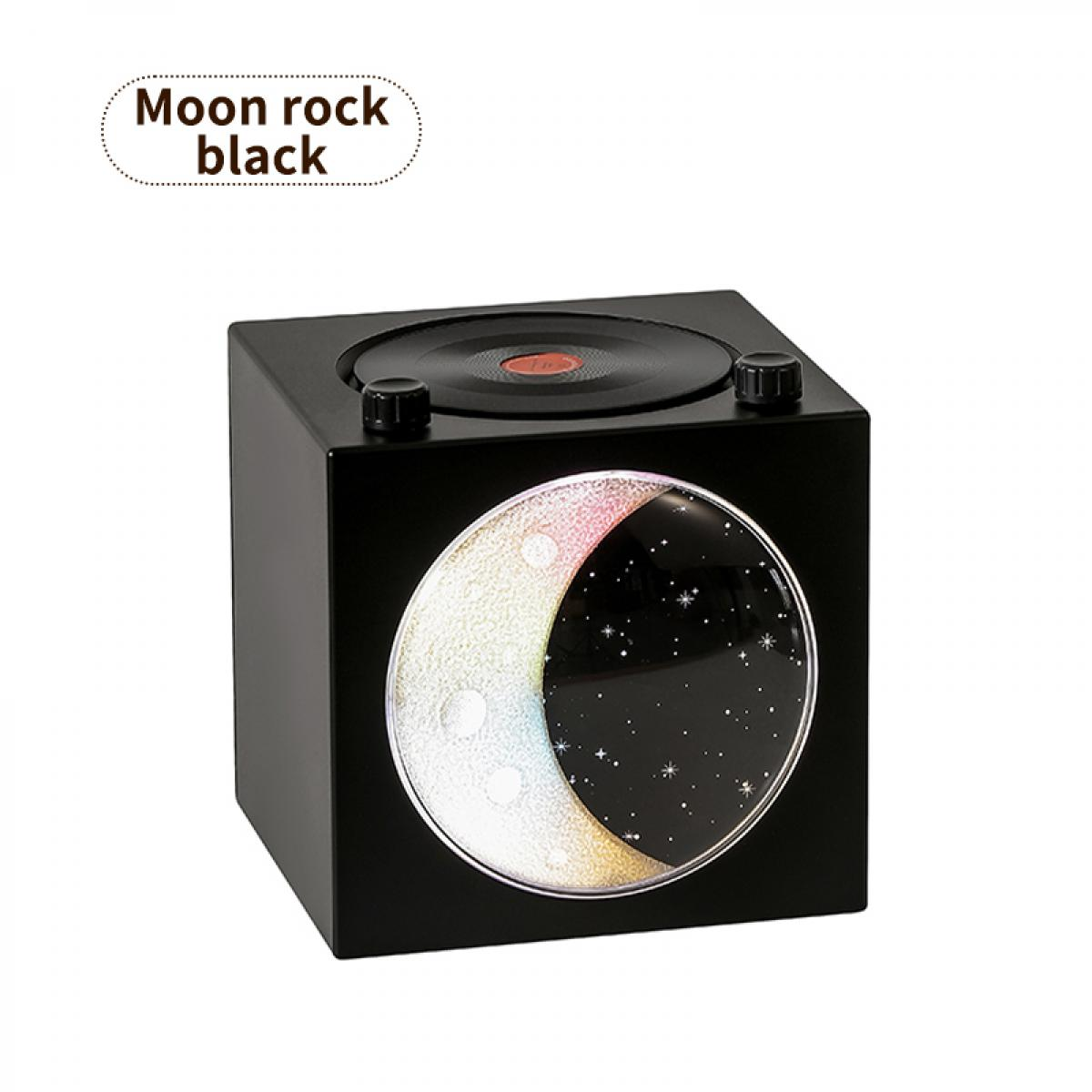 Schwarzer Würfel mit Vinyl-Plattenspieler-Oberseite und Mond/Sternen-Design.
