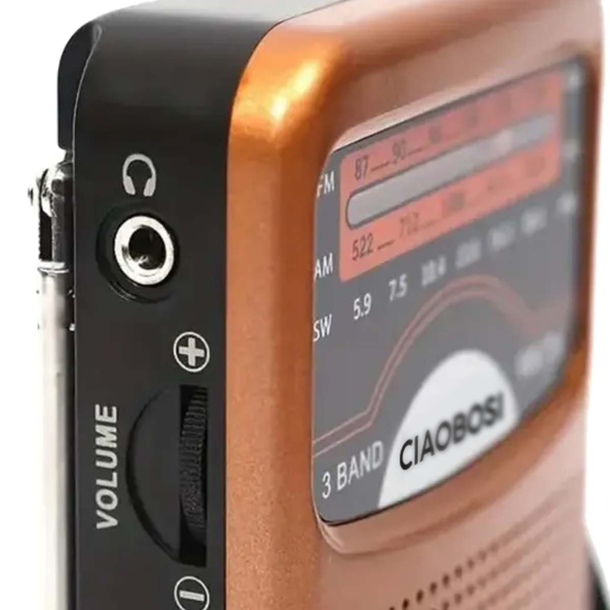 Ein oranges und schwarzes 3-Band-Radio mit Lautstärkeregler und Kopfhöreranschluss.