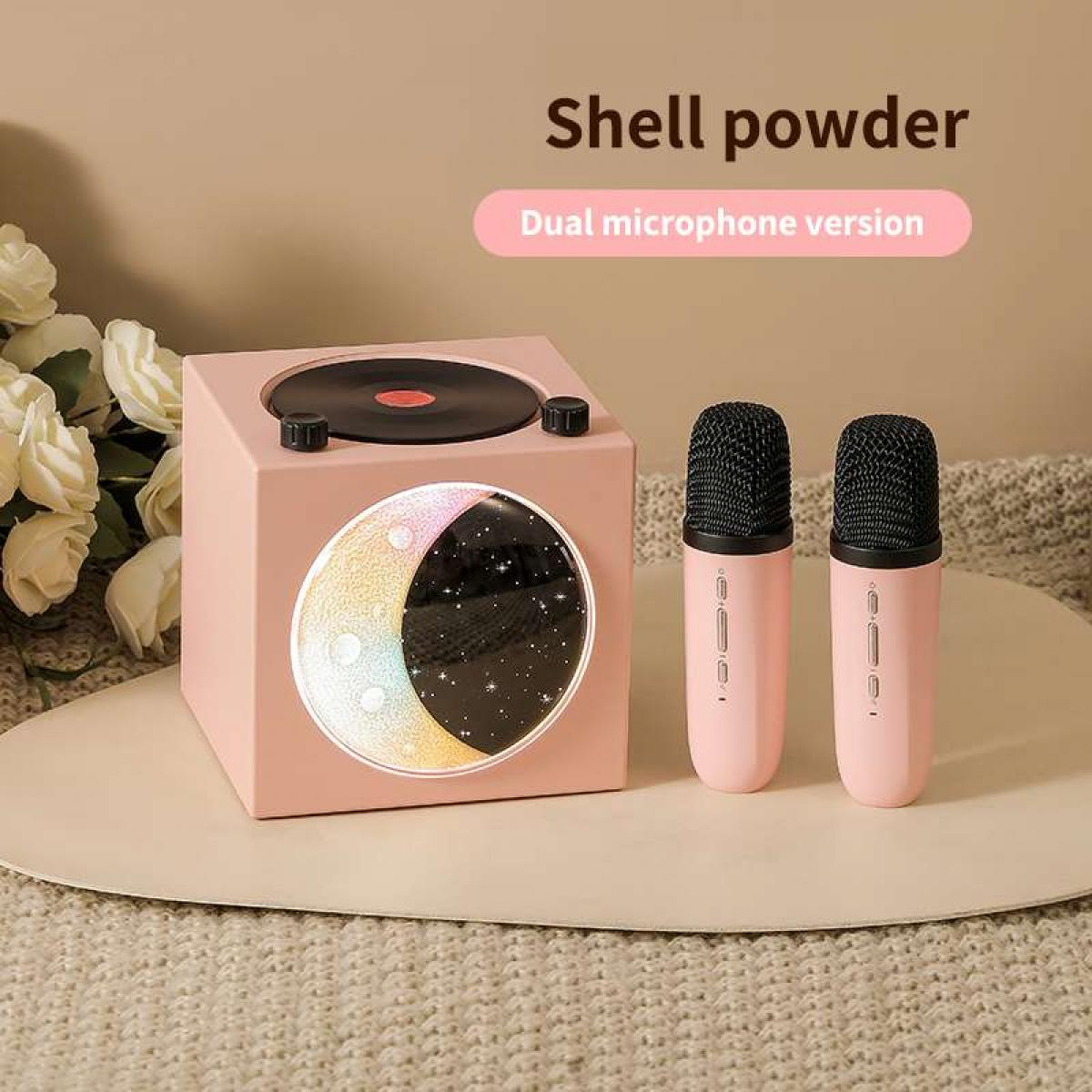 Ein pinker Lautsprecher mit Mond-Design und zwei Mikrofonen.