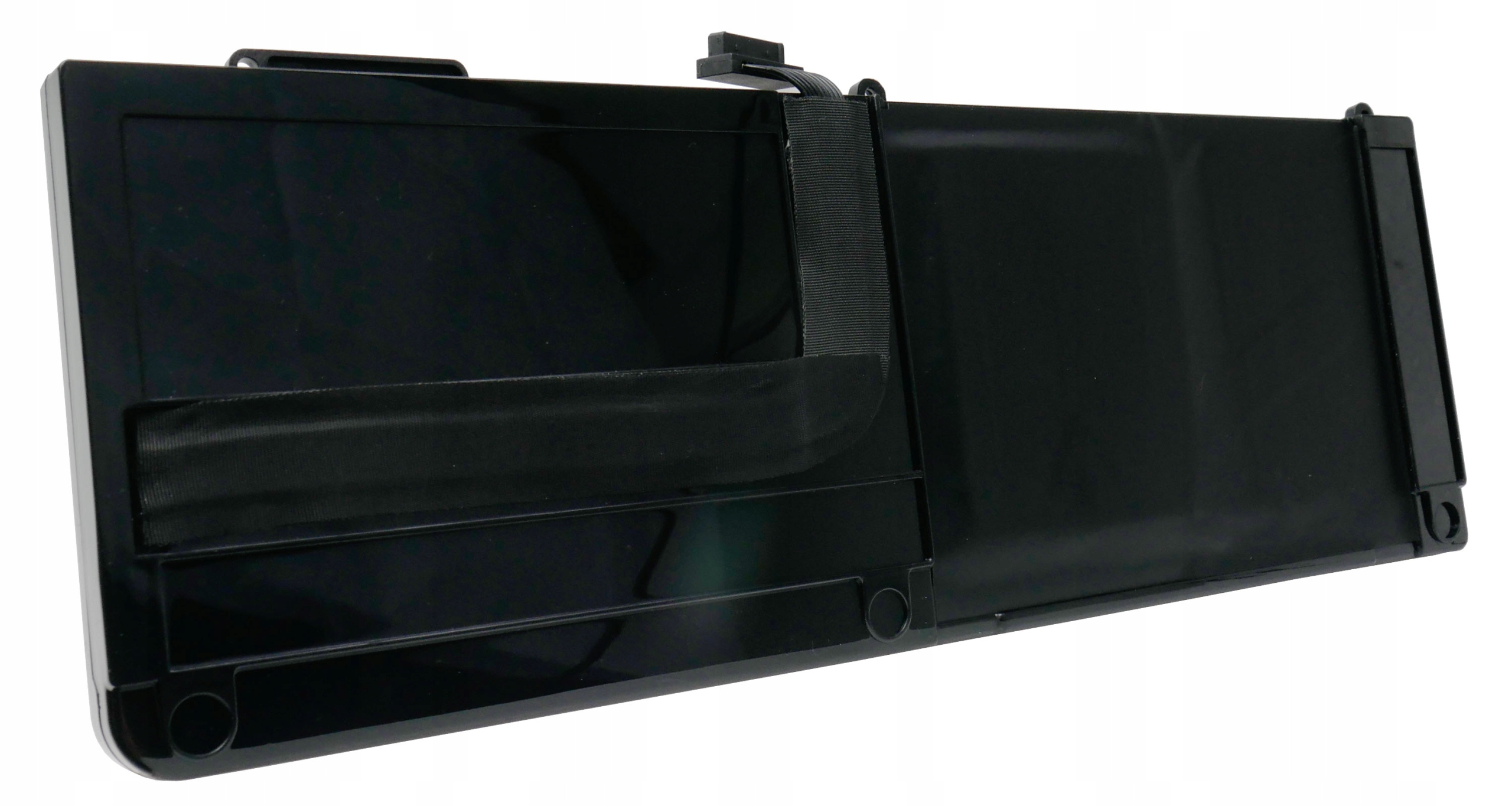 Czarny, prostokątny przedmiot z paskiem z tkaniny i klipsem.