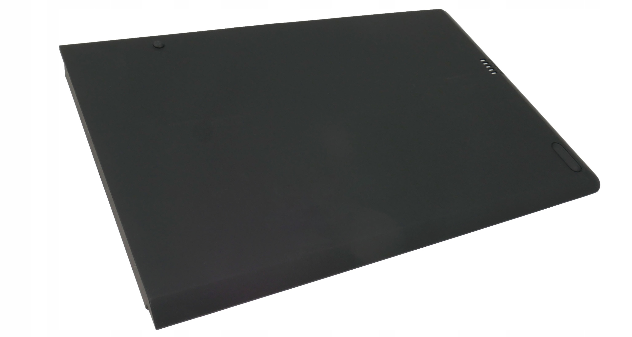 Czarny, płaski prostokąt z małymi światłami na górze i wycięciem po prawej.