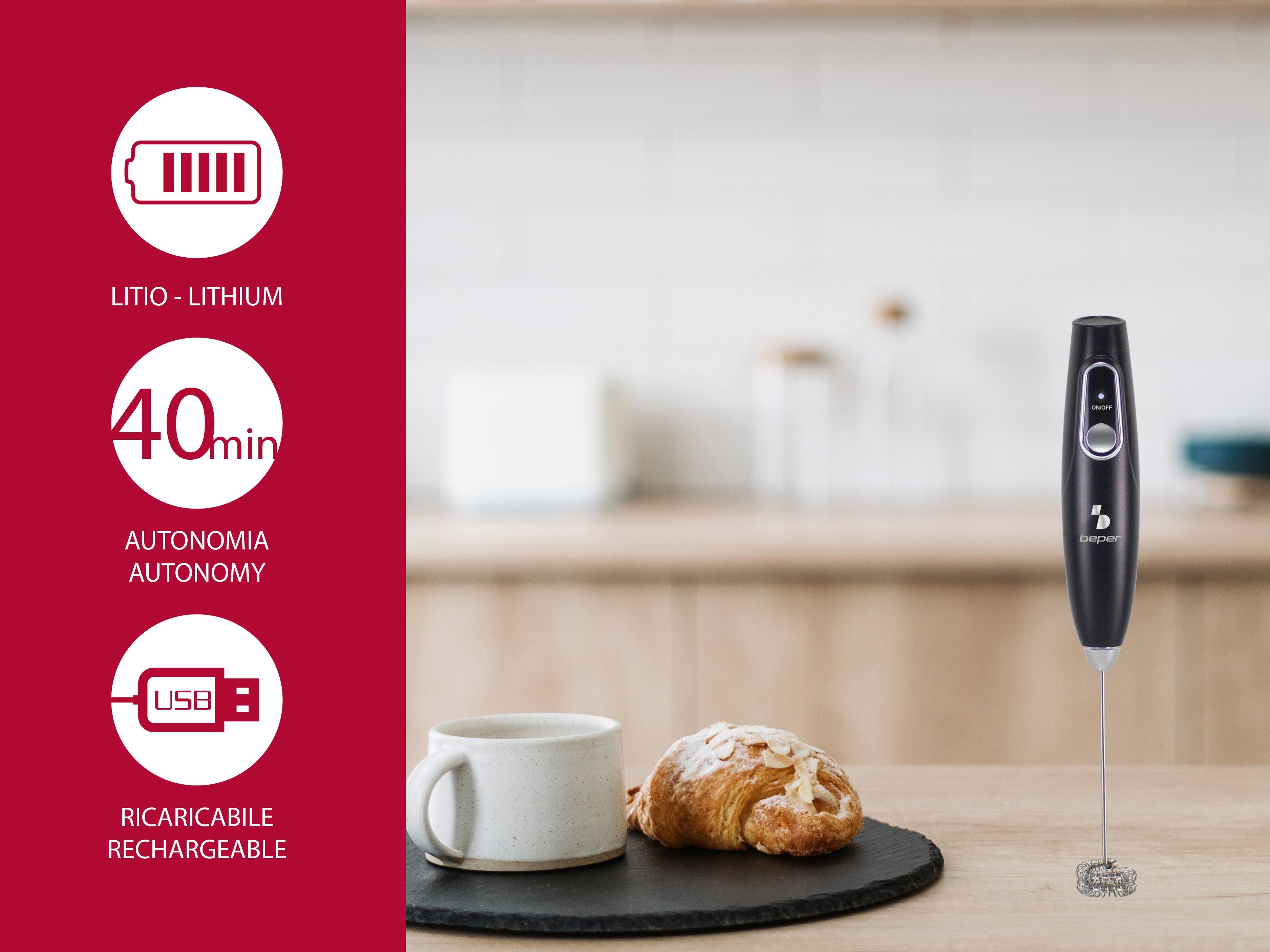 Un montalatte nero accanto a una tazza e un croissant.