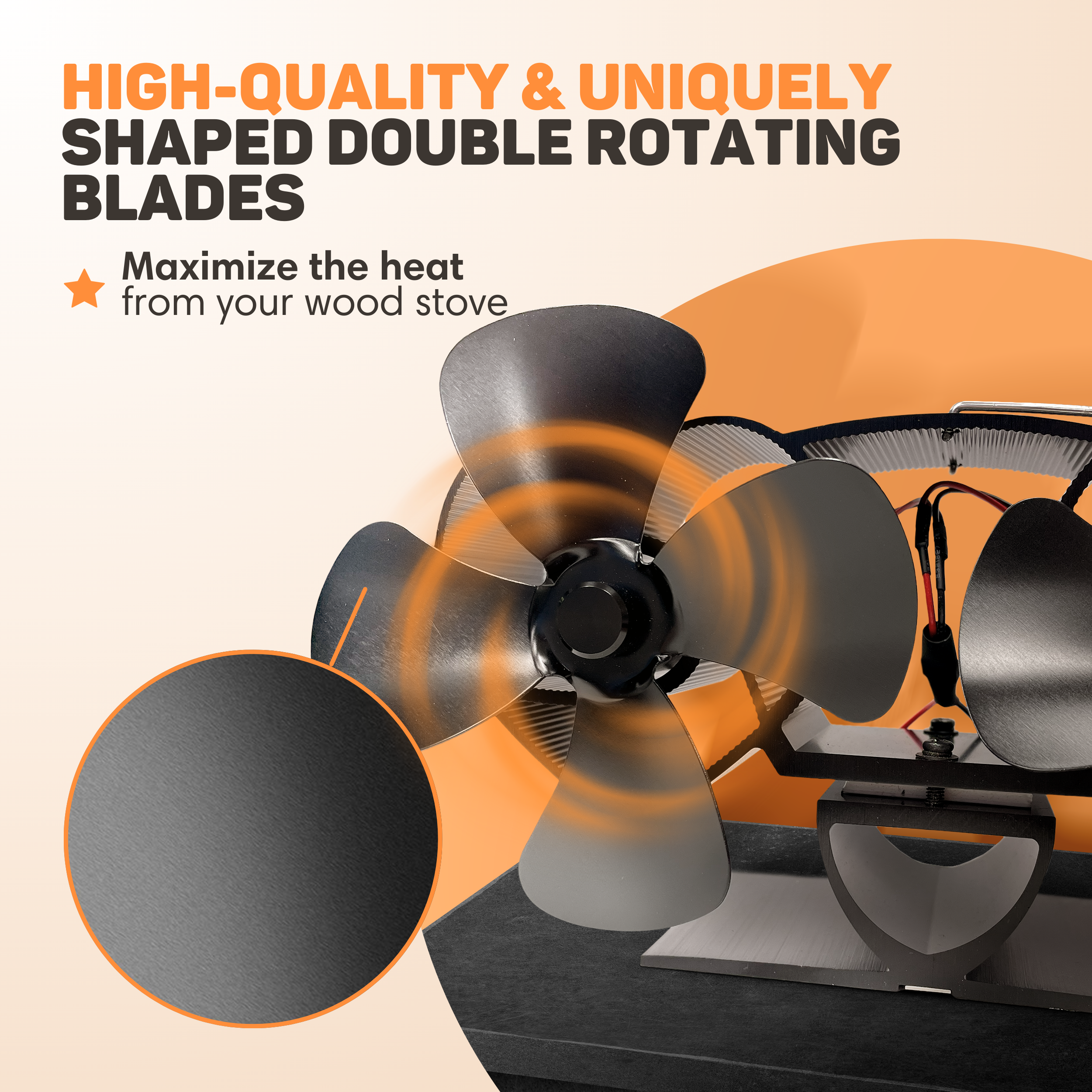 A heat-powered fan with black double rotating blades sits on a surface.