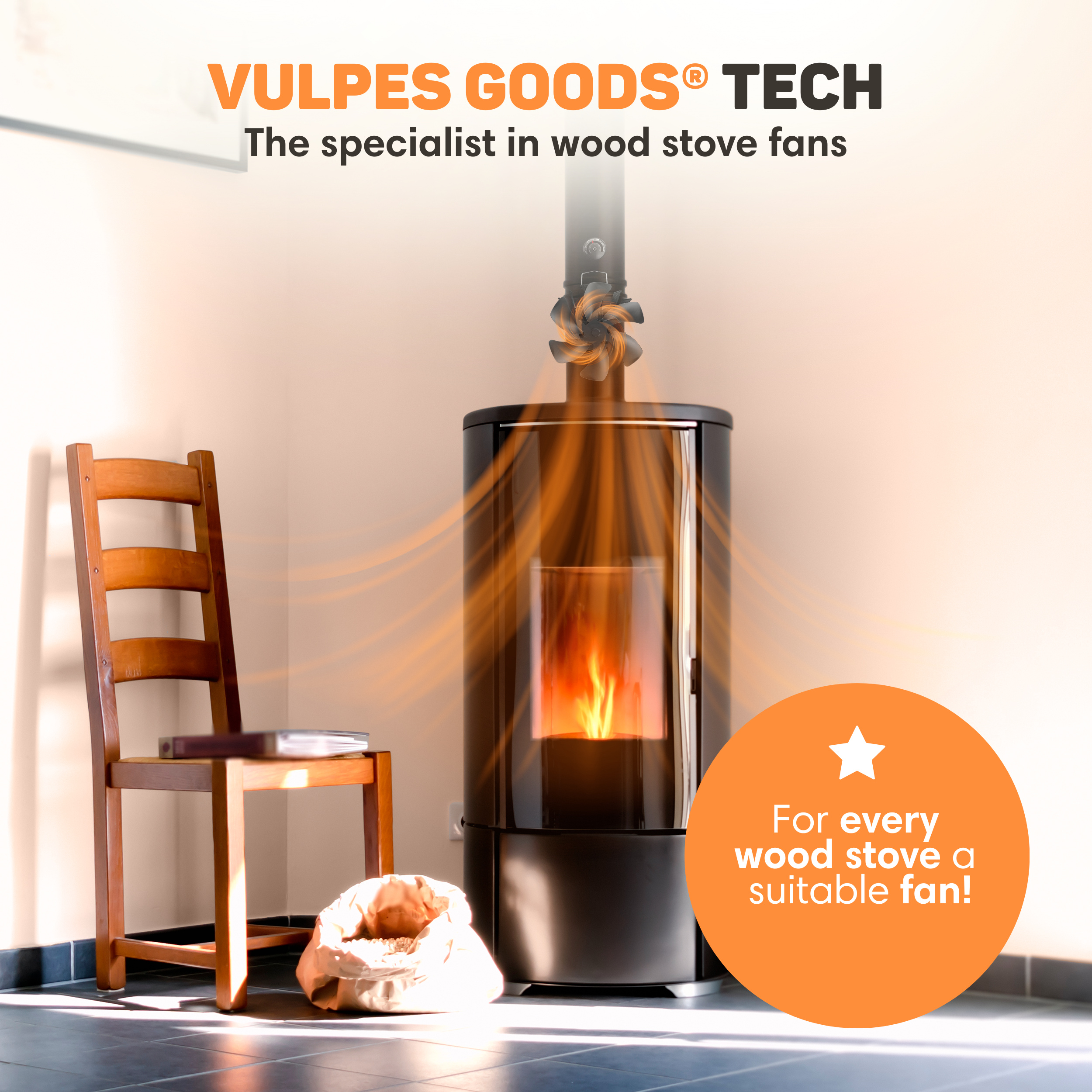 A wood stove with a fan on top distributing heat. A chair is beside it.
