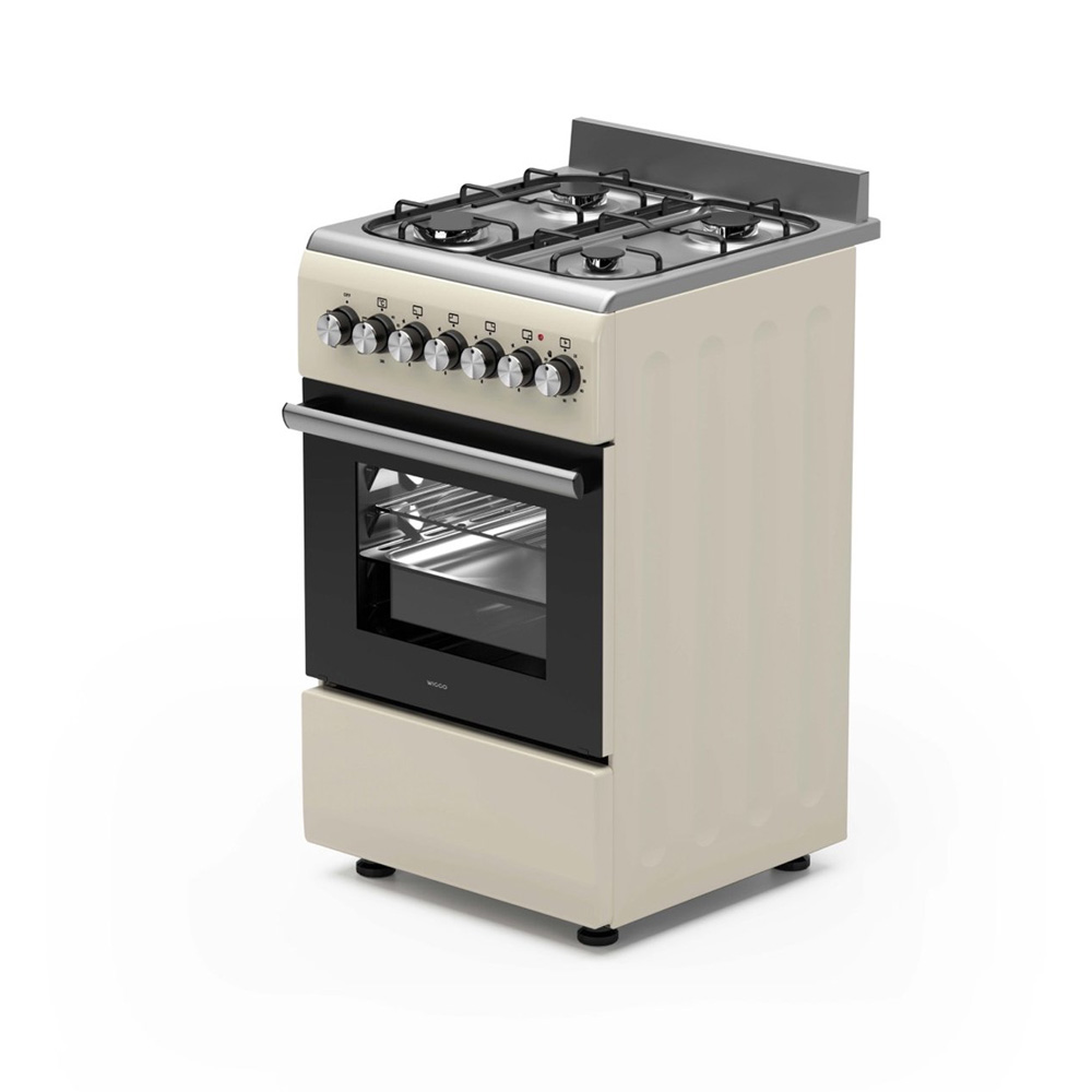 Une cuisinière à gaz couleur crème avec quatre brûleurs et un four.