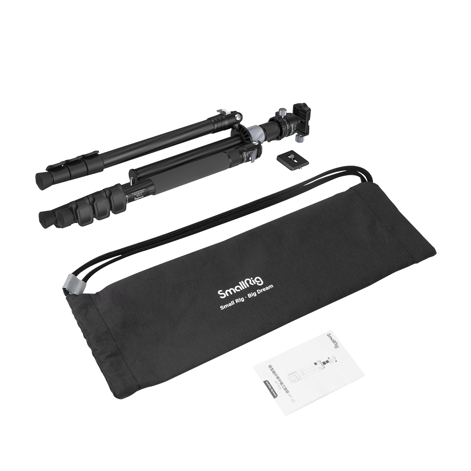 A black camera tripod with accessories lies on a white background.