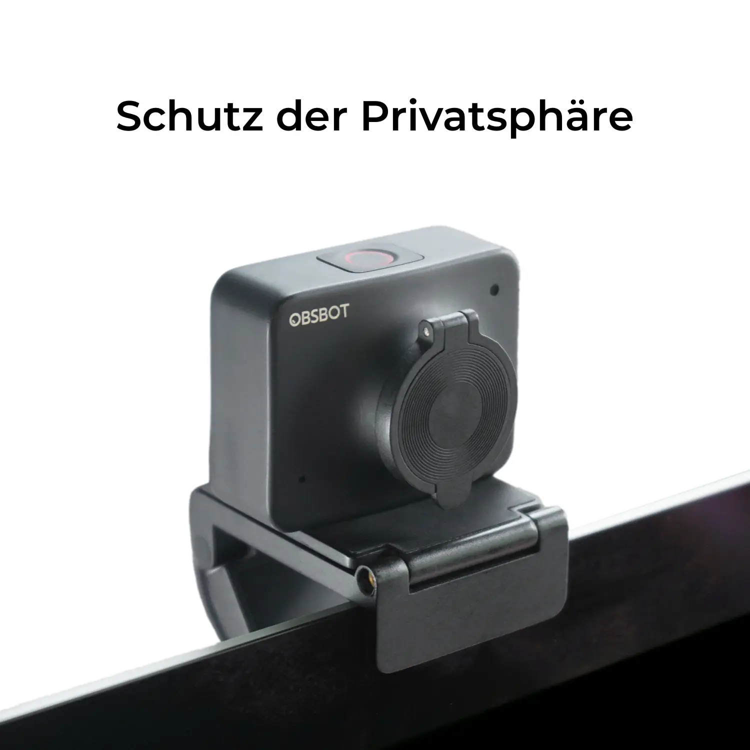Webcam OBSBOT nera con copriobiettivo su un display per laptop.