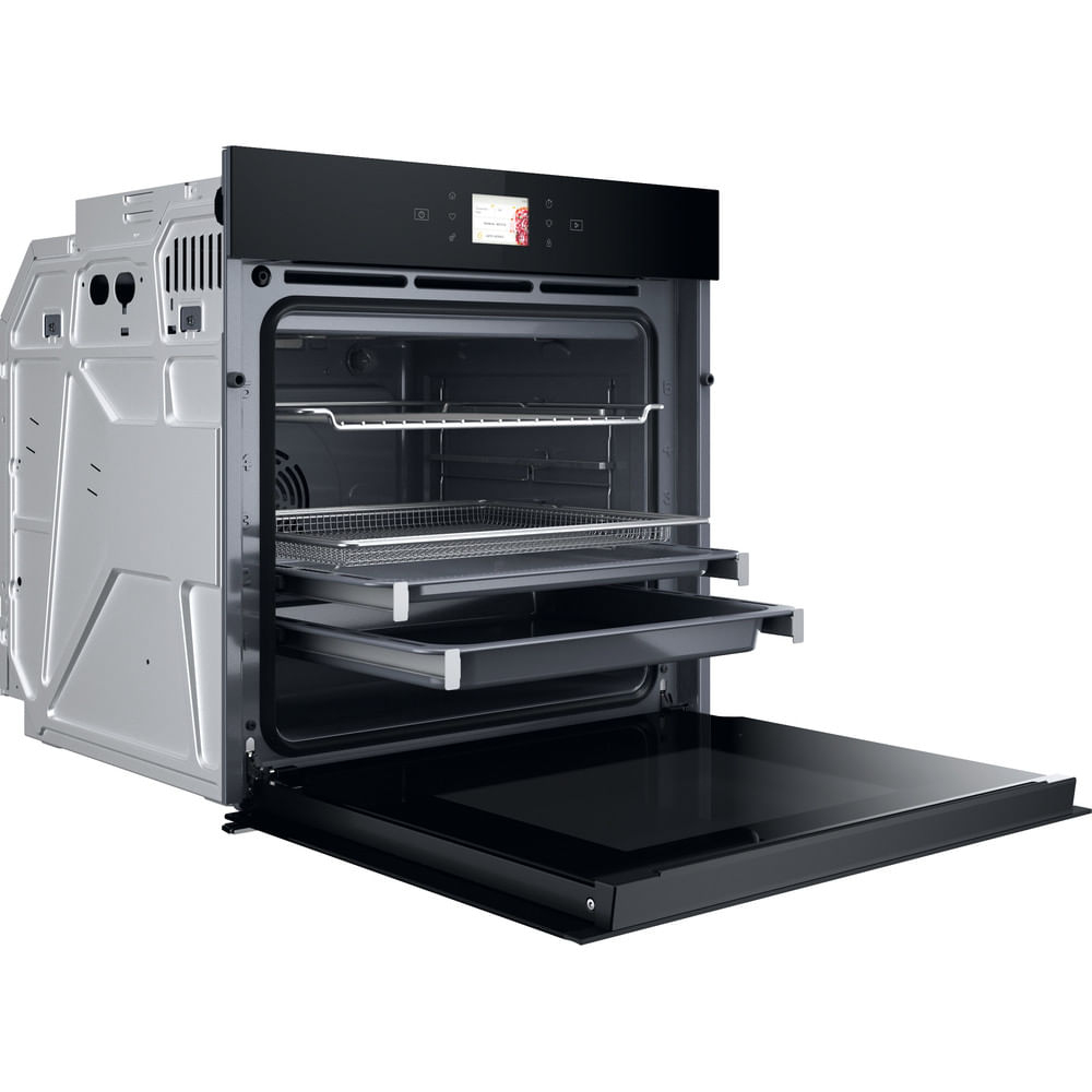 Un forno da incasso moderno con cassetto esteso e vano in vetro aperto.