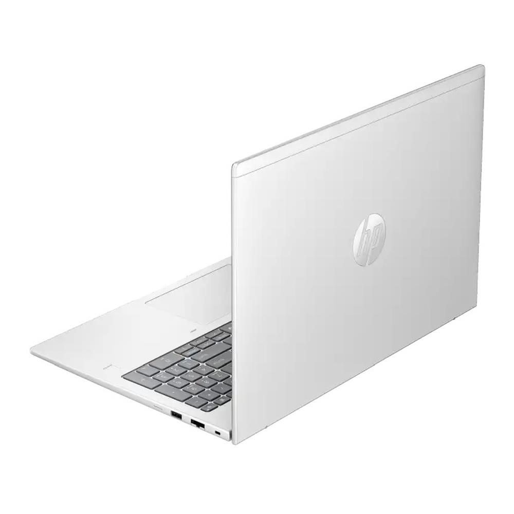 Biały laptop z srebrnym logo HP na pokrywie. Klawiatura jest widoczna.
