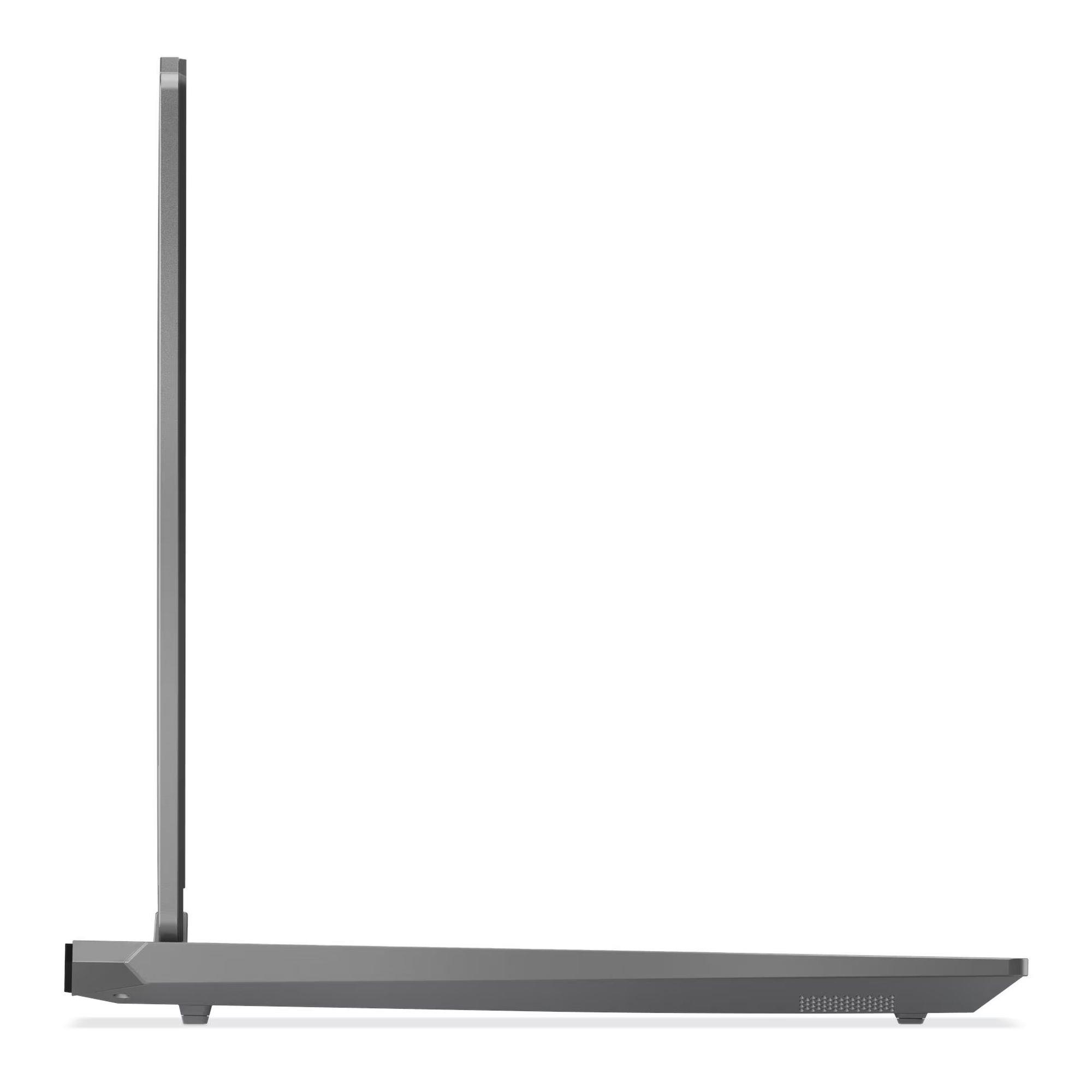 Szary laptop w profilu bocznym na białym tle.