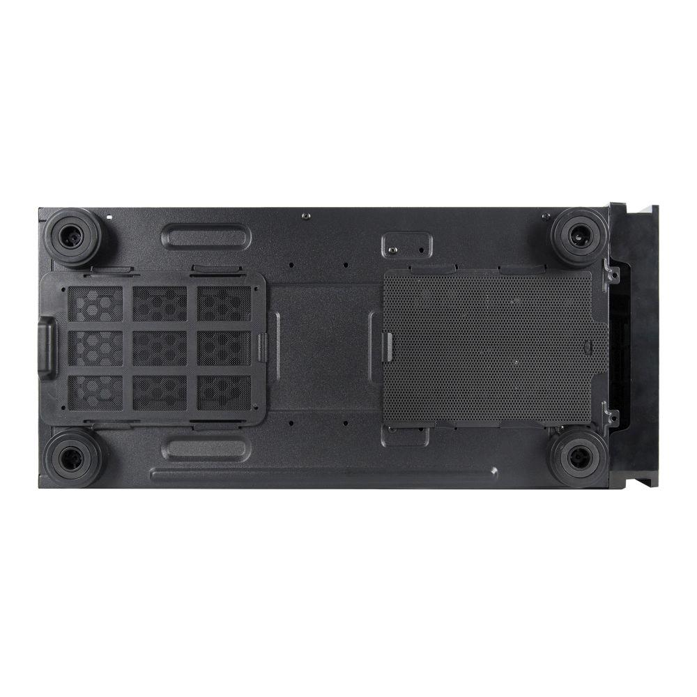 Spód czarnej obudowy komputera z czterema gumowymi nóżkami i otworami wentylacyjnymi.