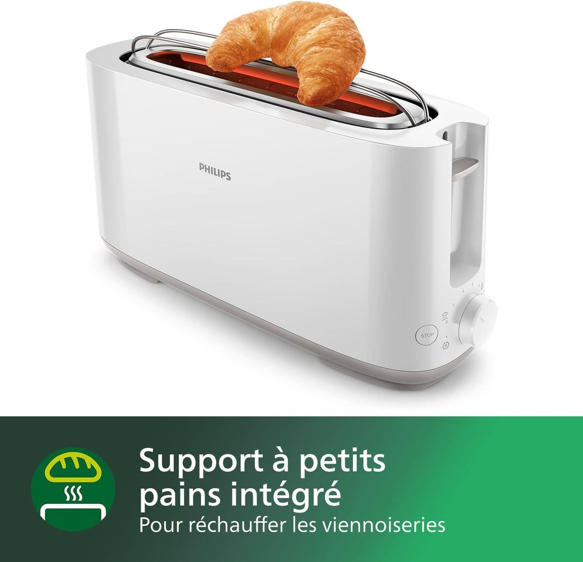 Ein weißer Toaster mit einem Croissant, das darauf liegt. Unten ist eine grüne Leiste.