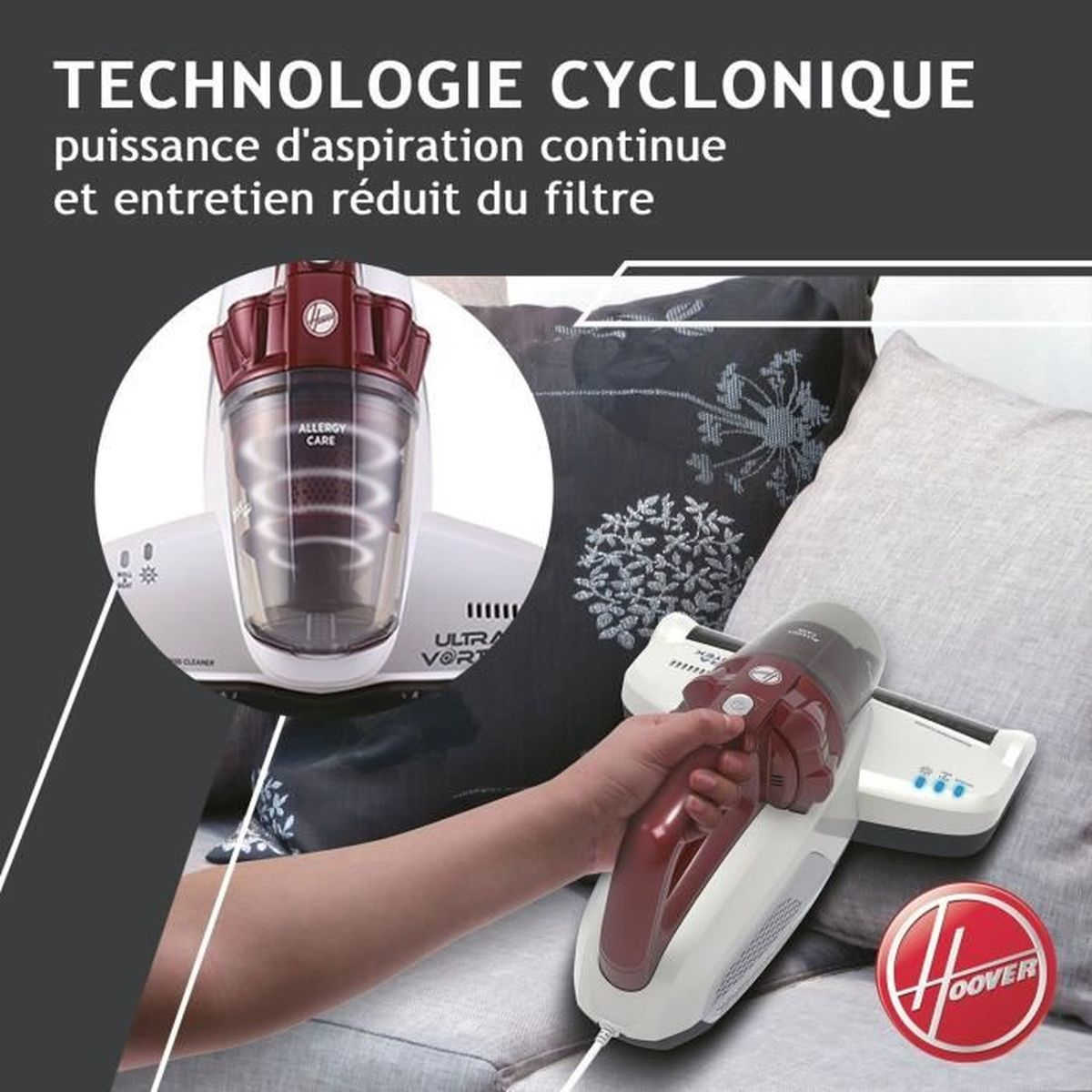 Una aspiradora de mano con tecnología ciclónica se sostiene en un sofá.
