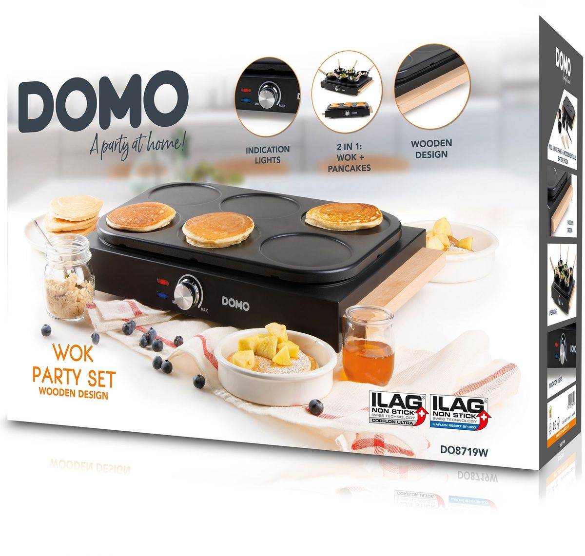 DOMO Party Set: Ein elektrischer Pfannkuchenbereiter mit 6 Mulden, garniert mit Blaubeeren und Honig.