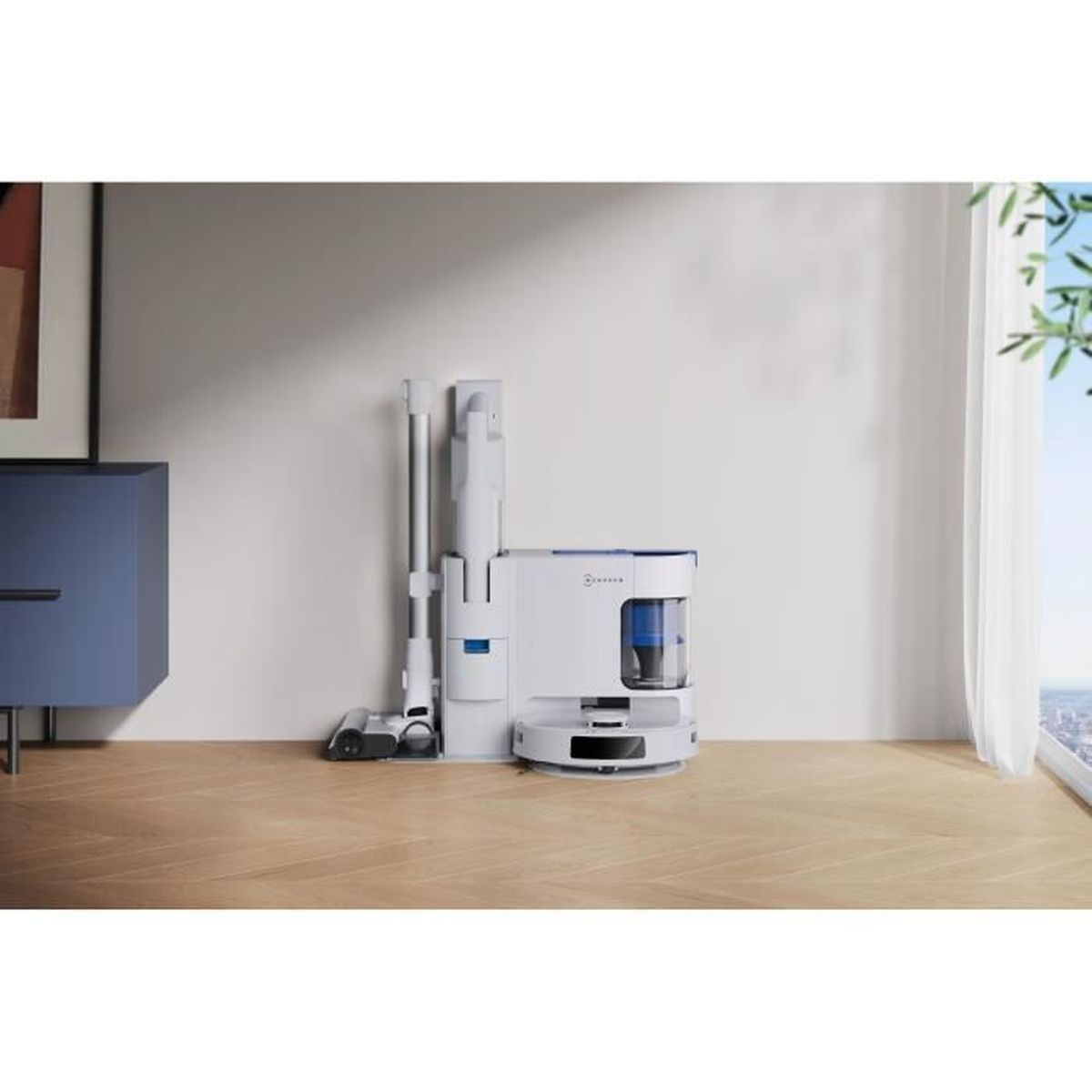 Un aspirateur robot blanc avec station d'accueil et aspirateur à main.