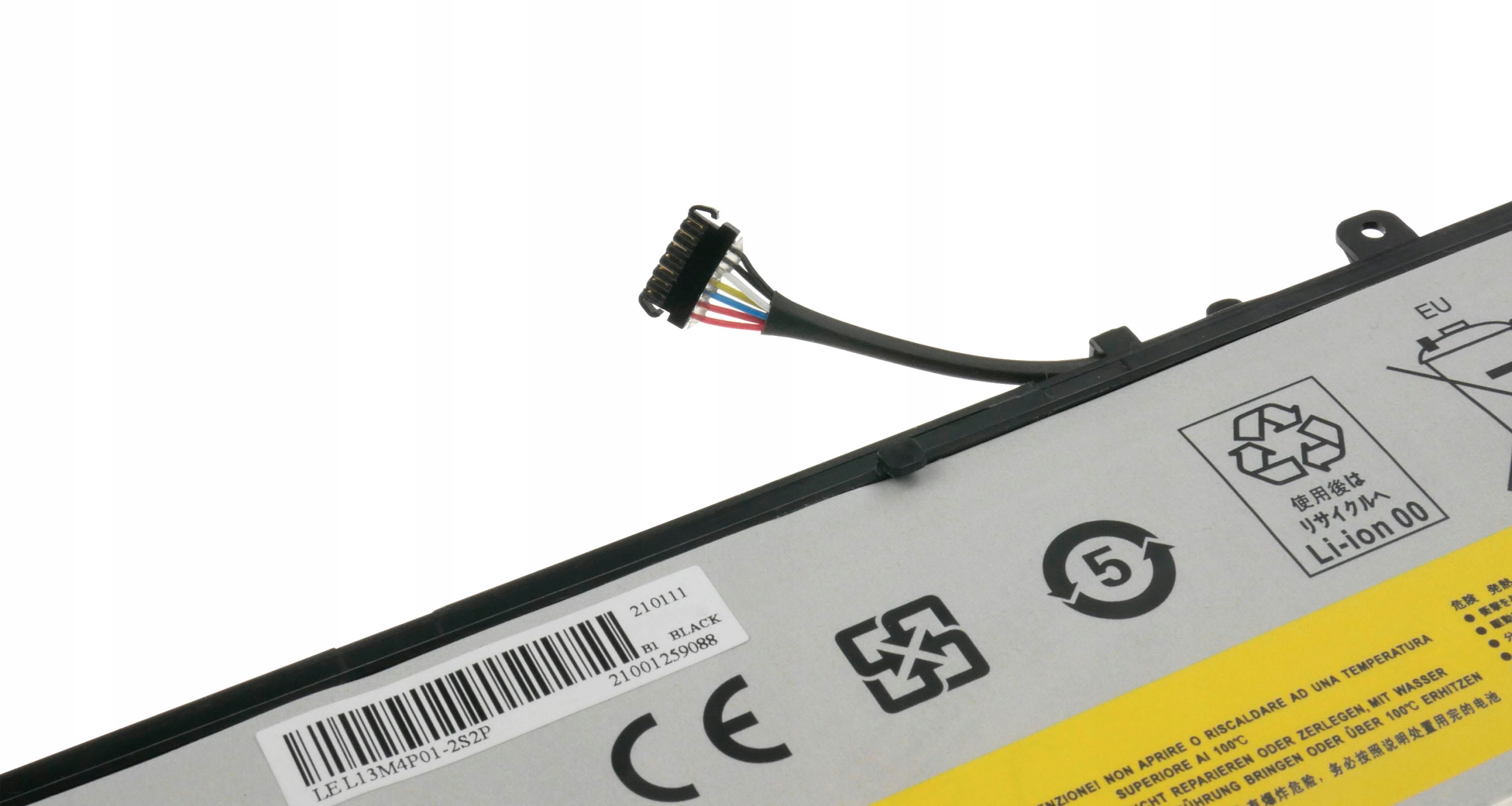 Bateria laptopa z kablem i symbolami ostrzegawczymi. Część tekstu jest czytelna.