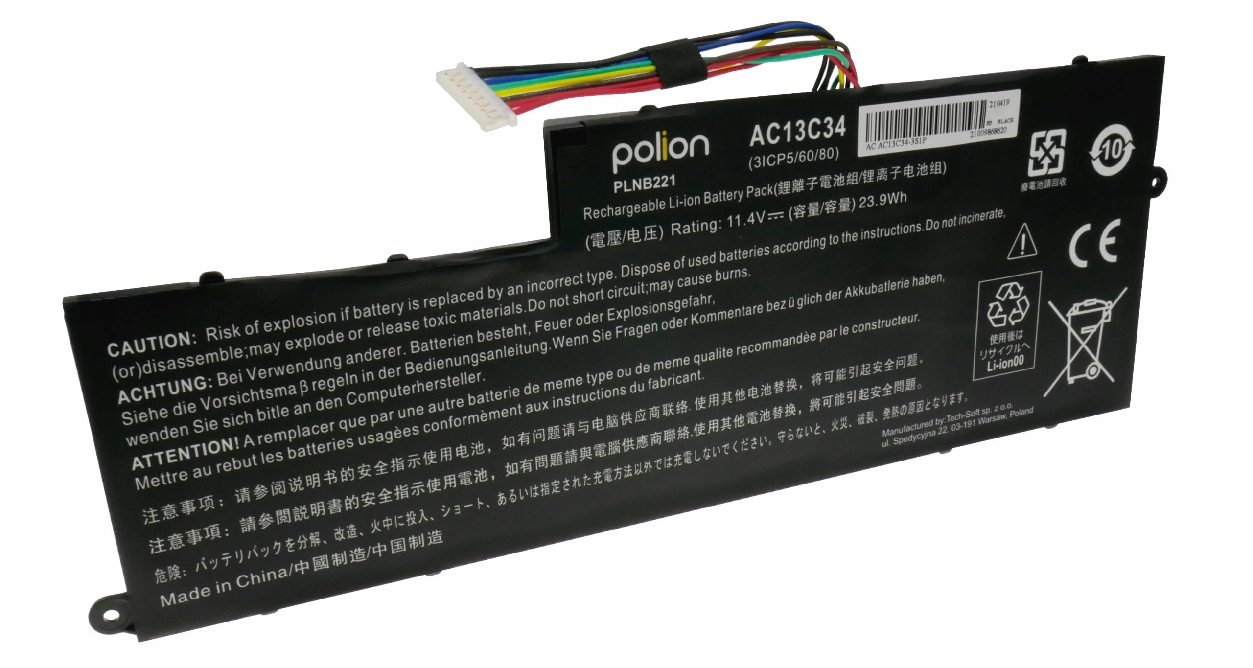 Czarny akumulator do laptopa z kablami, ostrzeżeniami i symbolami recyklingu.