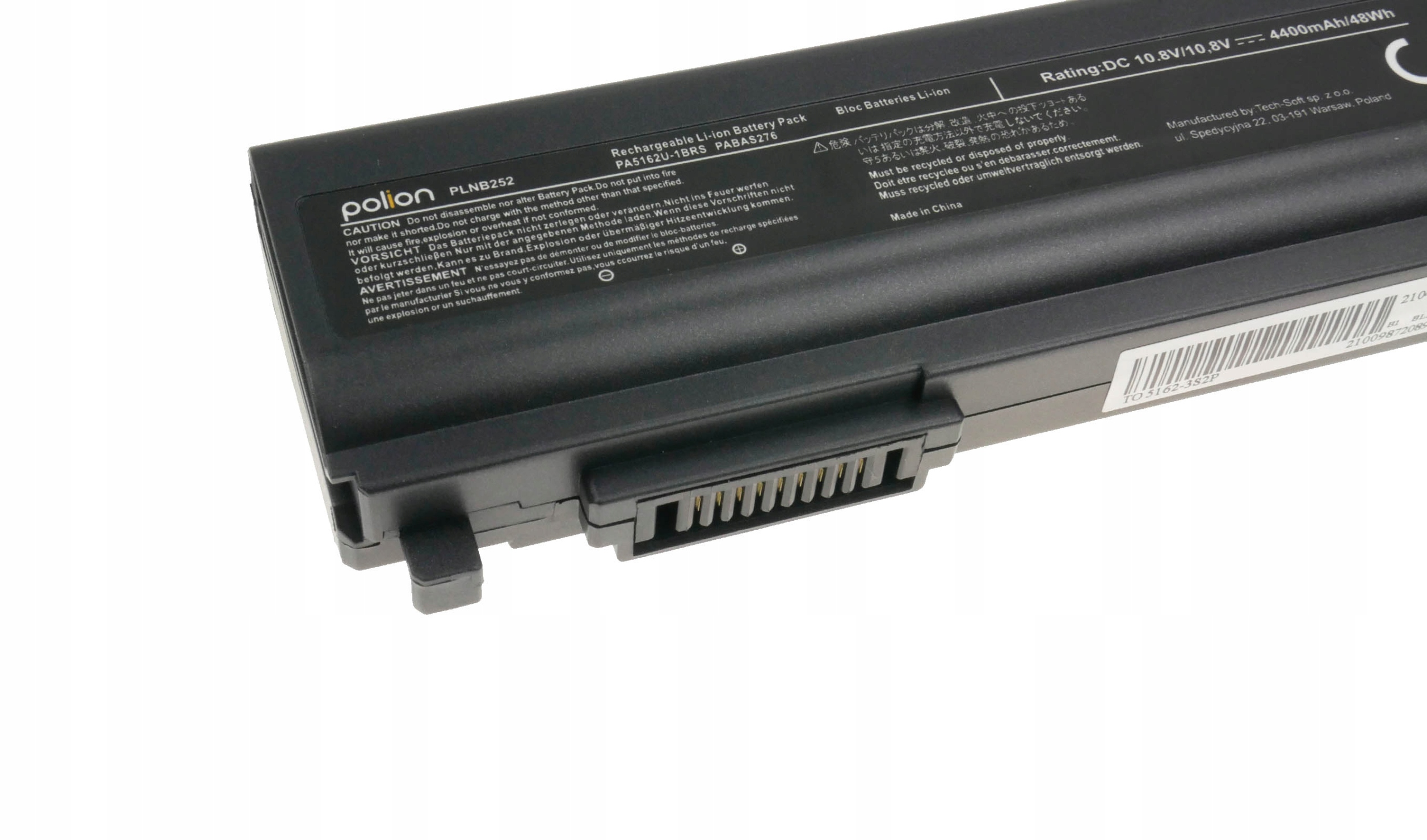 Czarny akumulator do laptopa z ostrzeżeniami i danymi technicznymi.