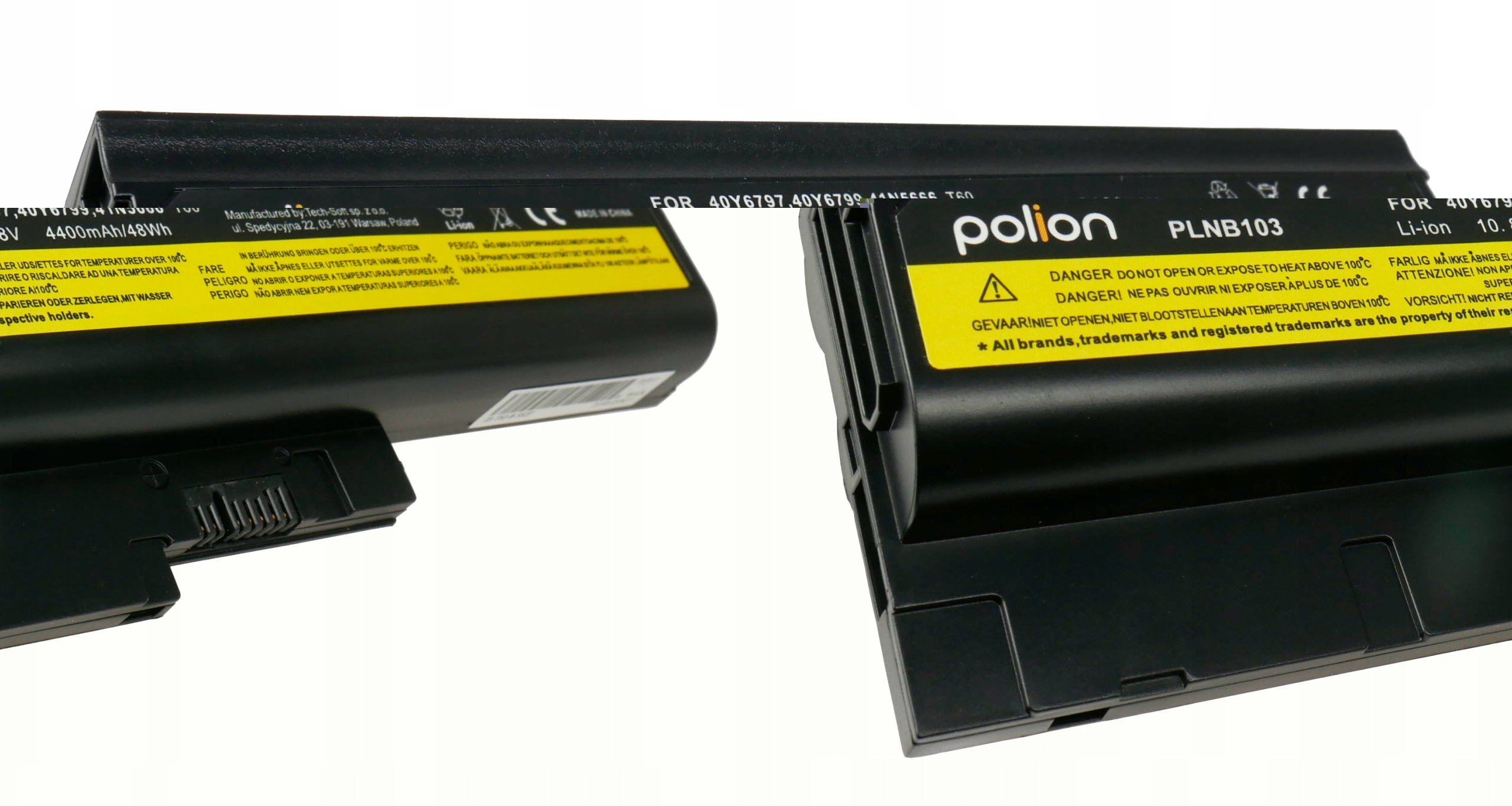 Dwa czarne akumulatory do laptopa, jeden z żółtą etykietą ostrzegawczą.