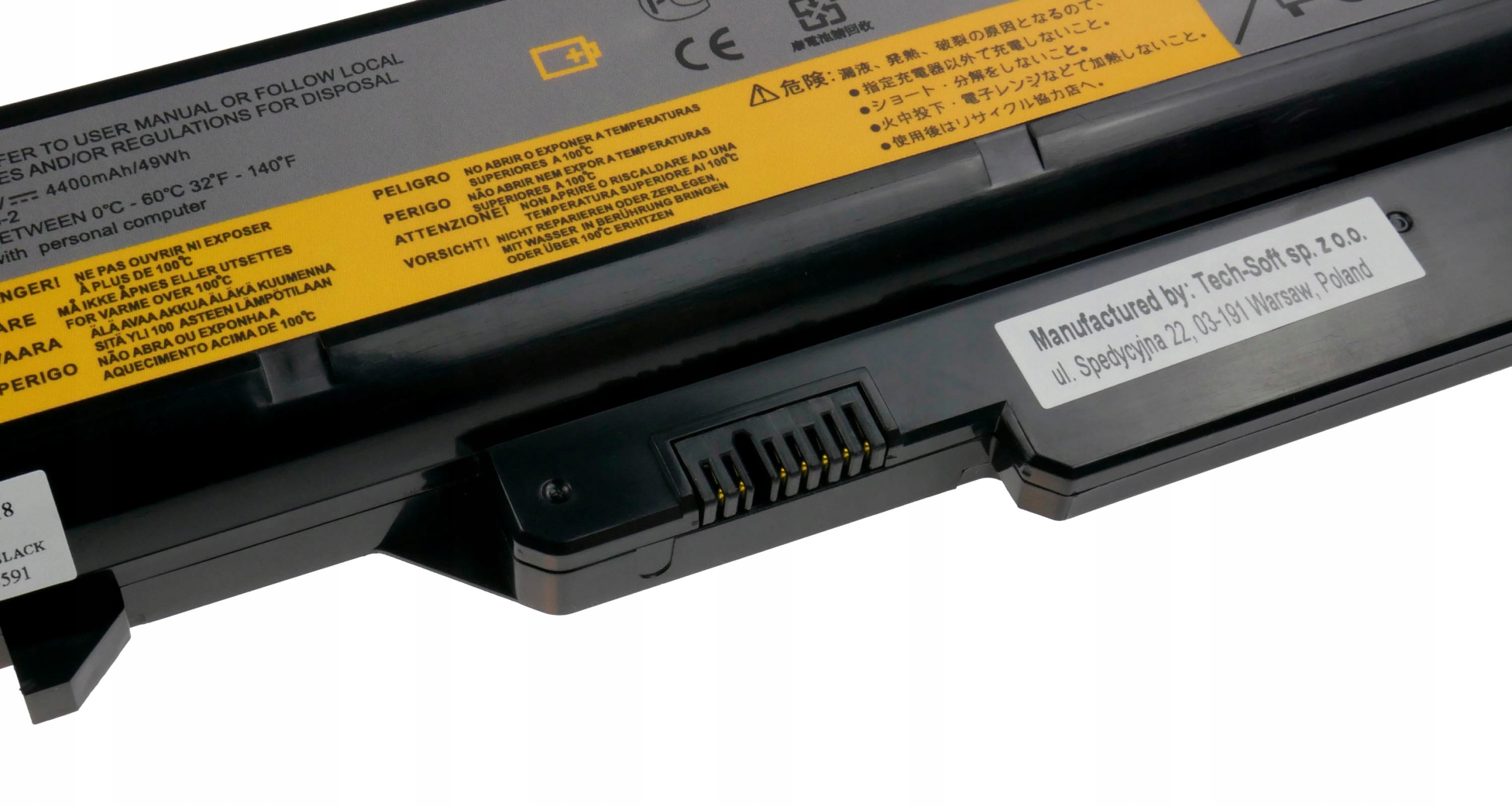 Czarny akumulator z wielojęzycznymi ostrzeżeniami, znakiem CE i danymi producenta.