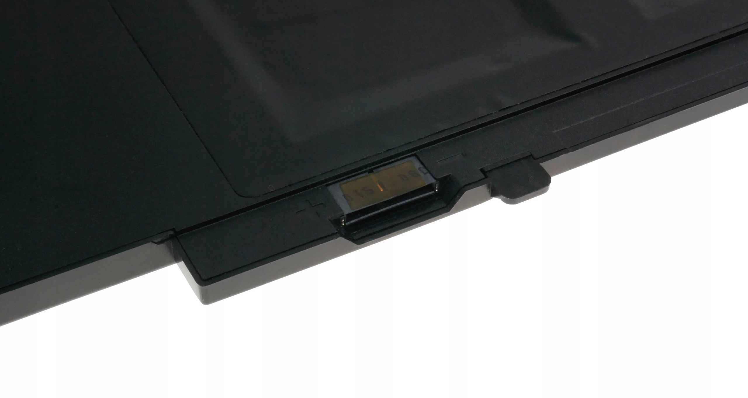 Czarny konektor baterii ze złotymi stykami i napisami.