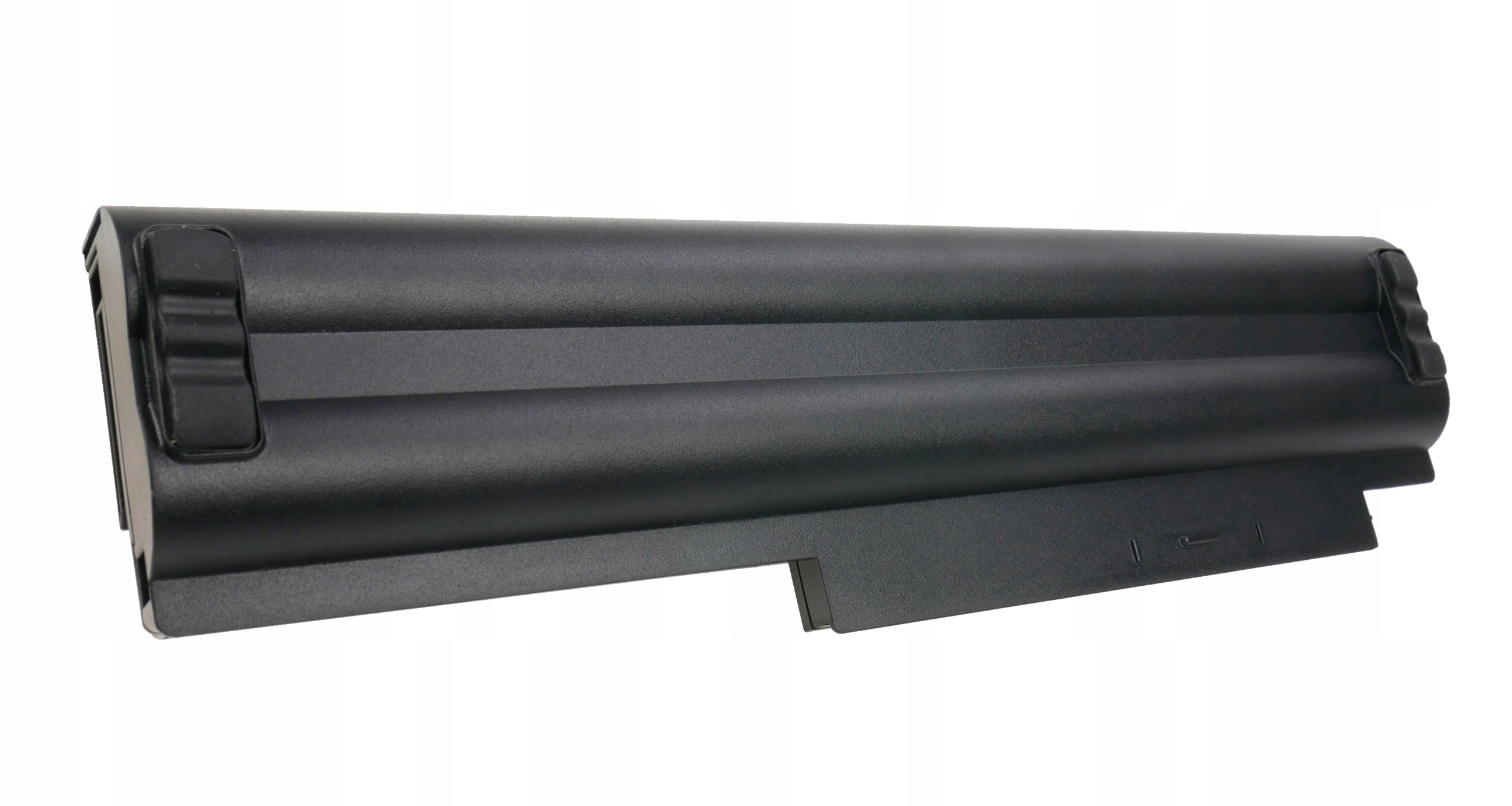 Czarna bateria do laptopa z prążkowaną górą i mechanizmami blokującymi.